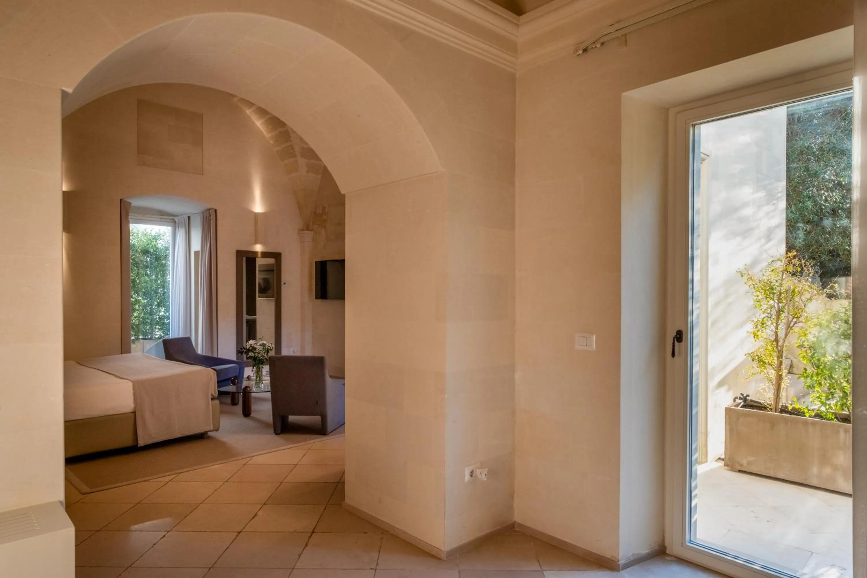 Patio, Bed in La Fiermontina Luxury Home Hotel