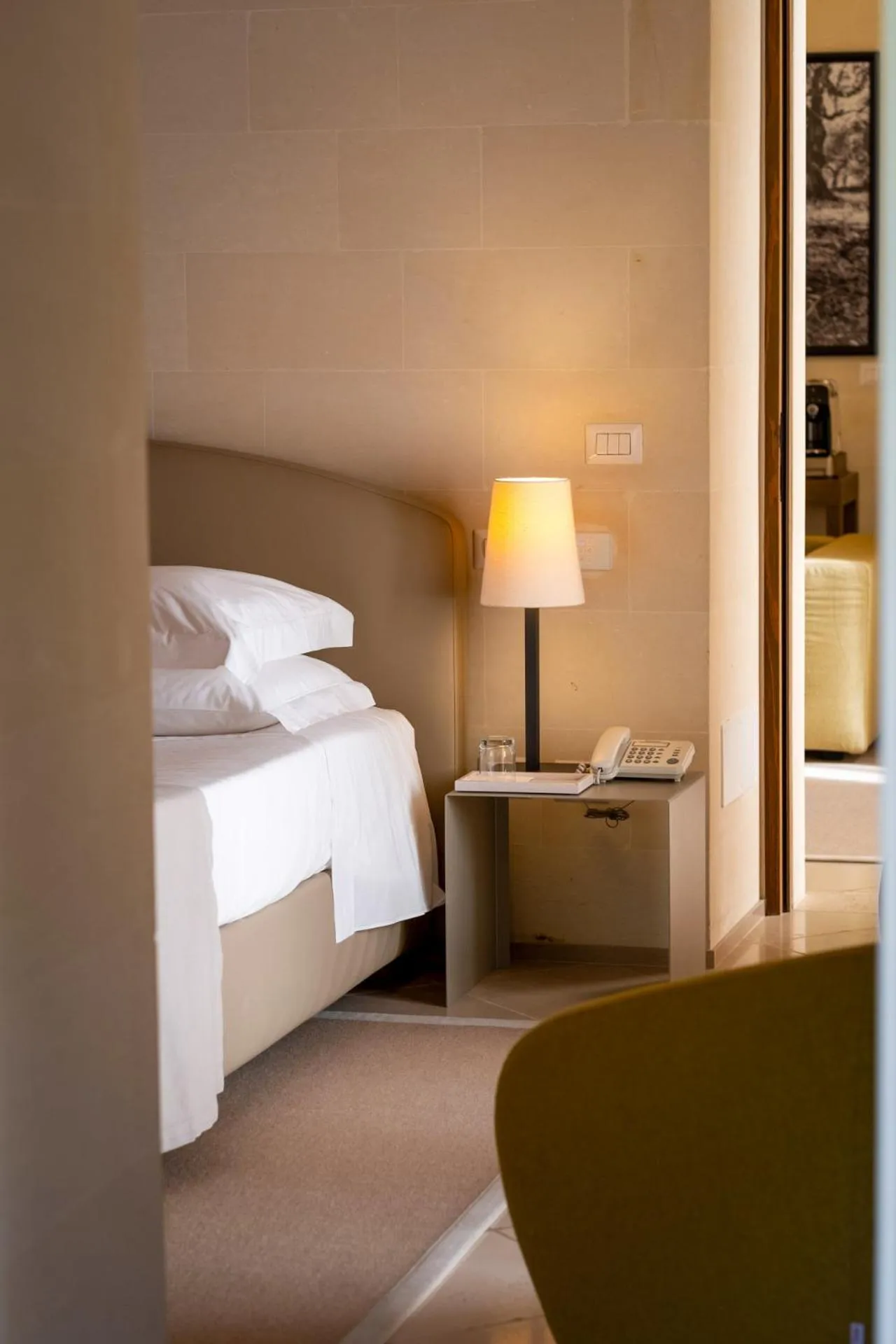 Bed in La Fiermontina Luxury Home Hotel