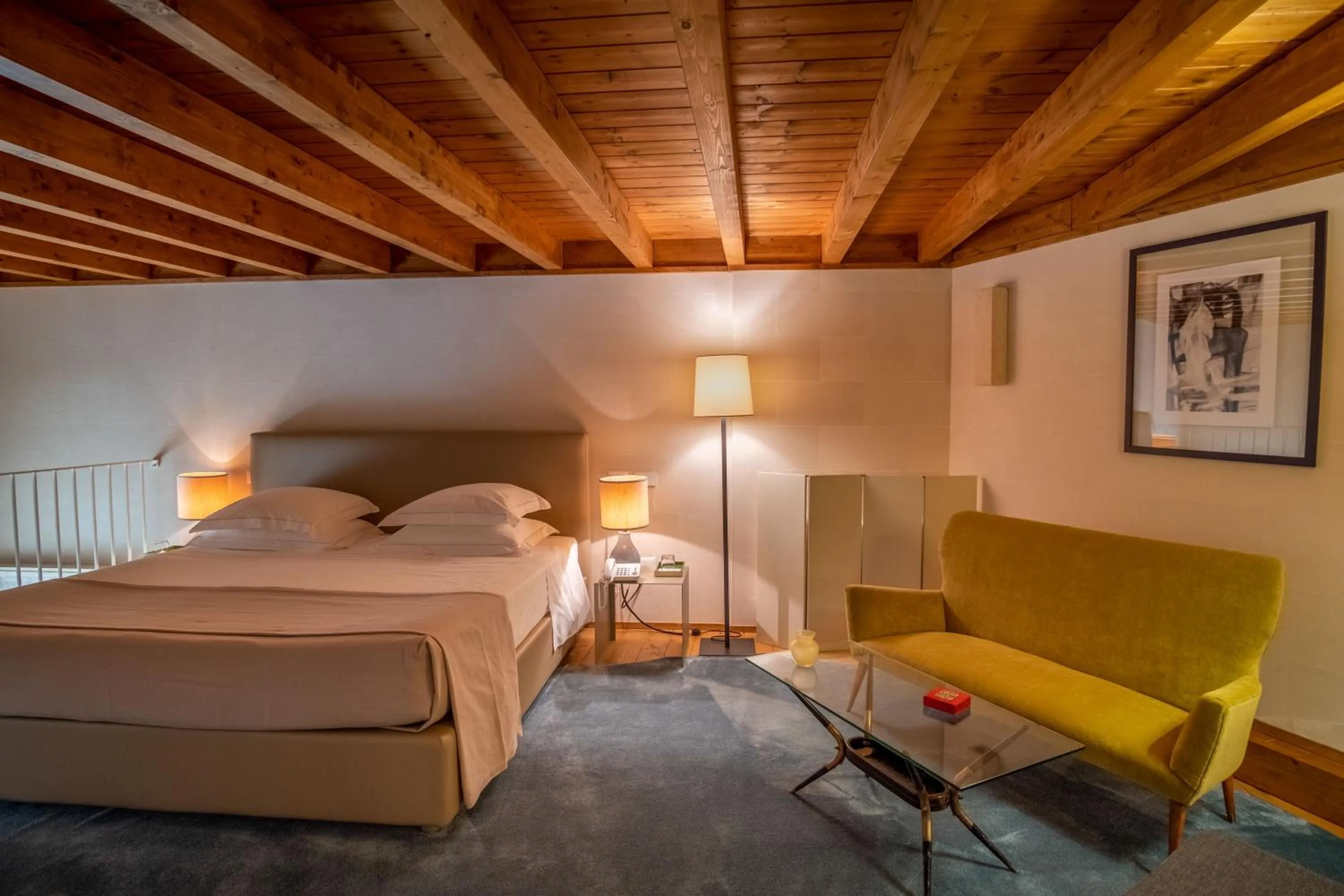 Bed in La Fiermontina Luxury Home Hotel