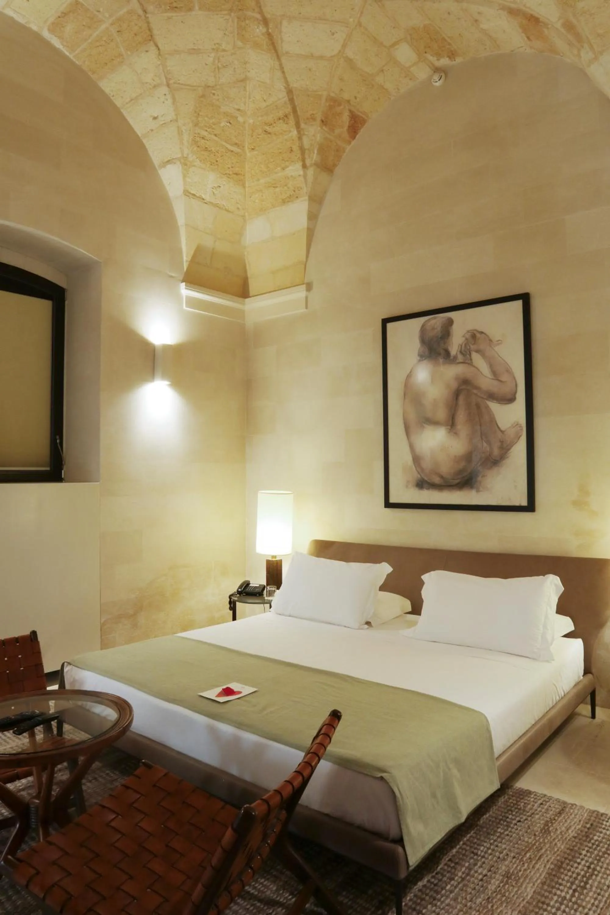 Bed in La Fiermontina Luxury Home Hotel