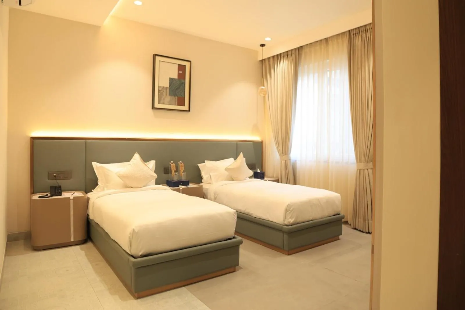 Bed in Quad Hotels Hyderabad