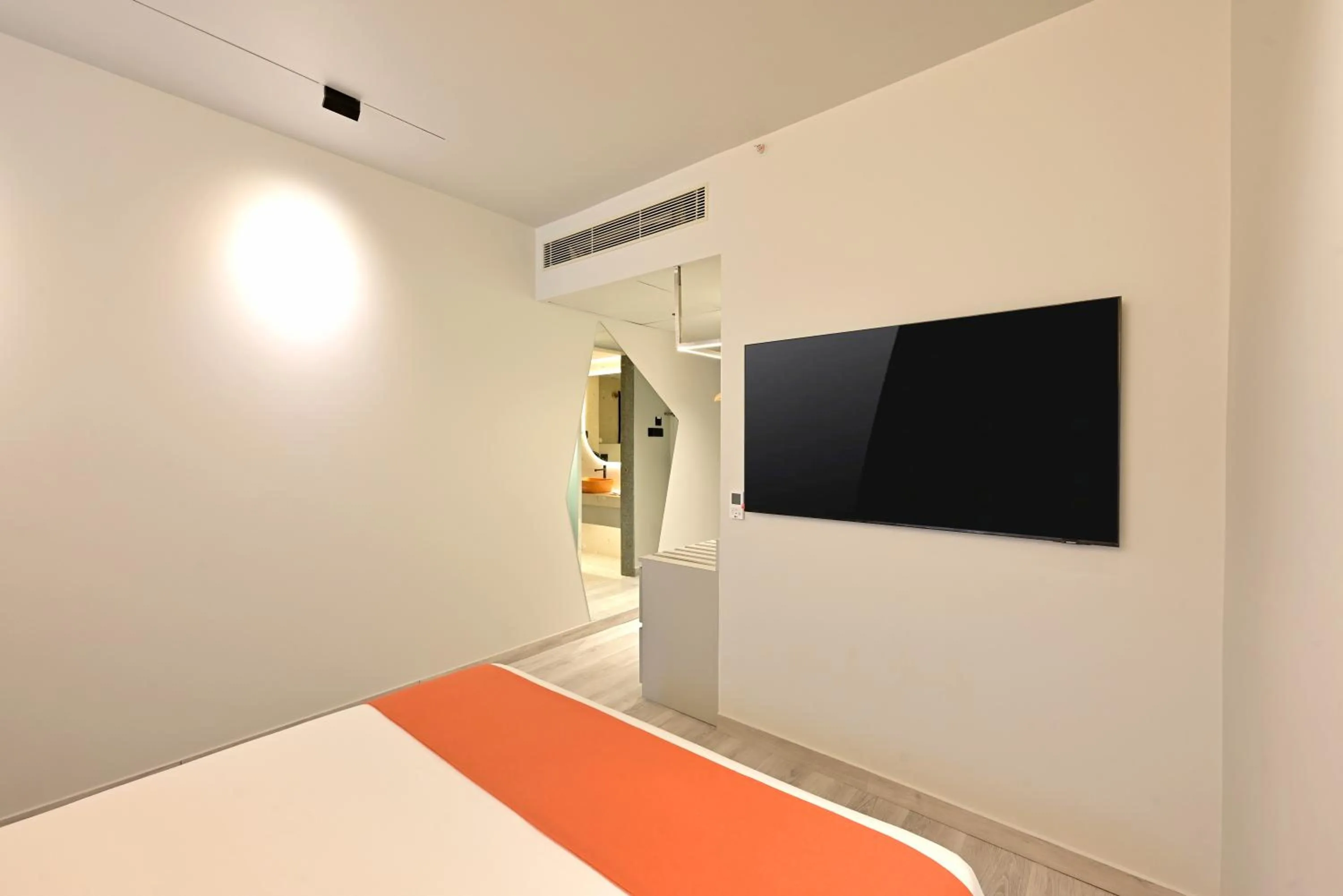 TV and multimedia, Bed in Ira by Orchid Hyderabad Hitech City Mindspace IT Park