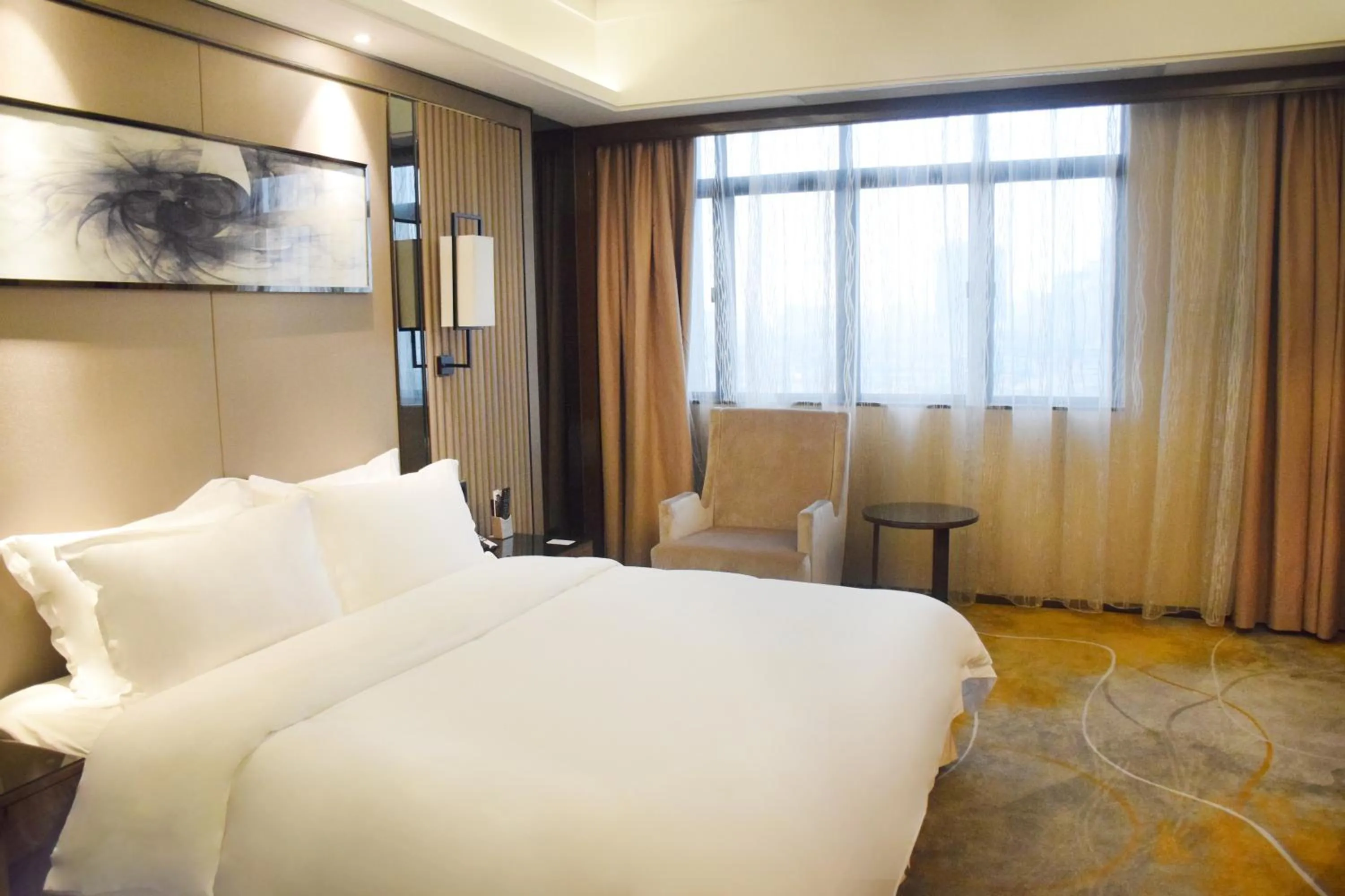 Bed in Ramada Foshan Hotel