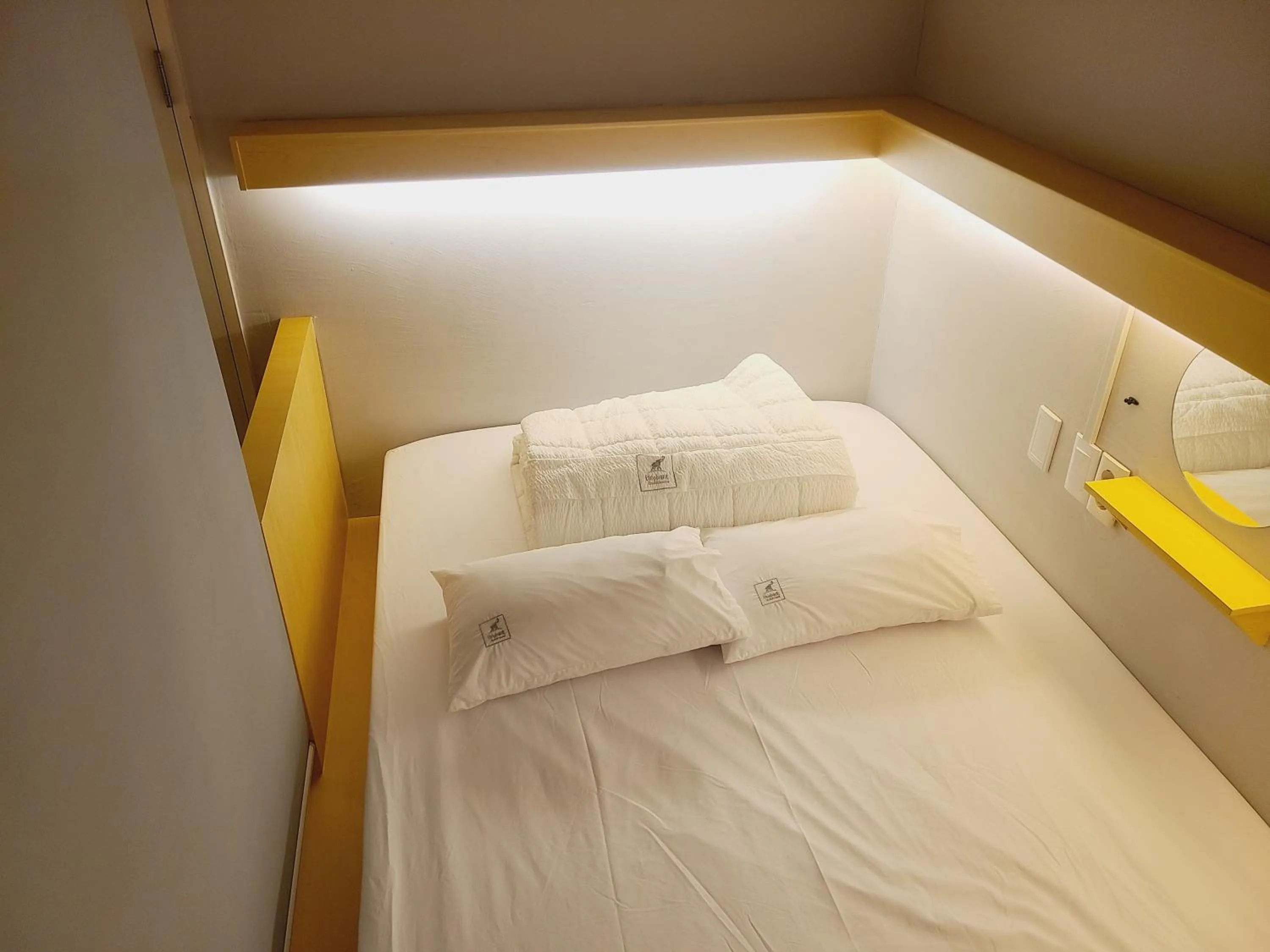 Bed in Elephant Hostel Nampo