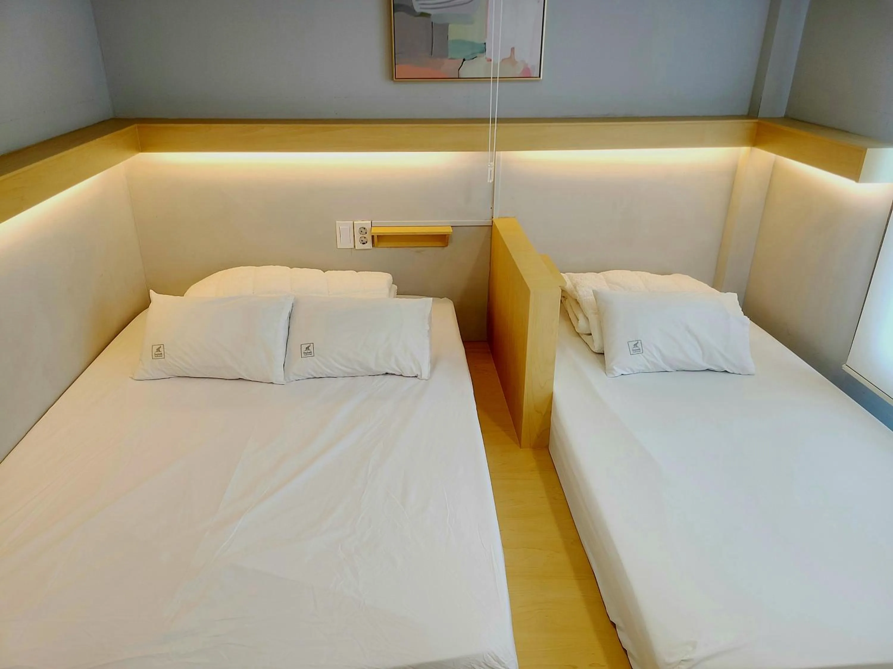 Bed in Elephant Hostel Nampo