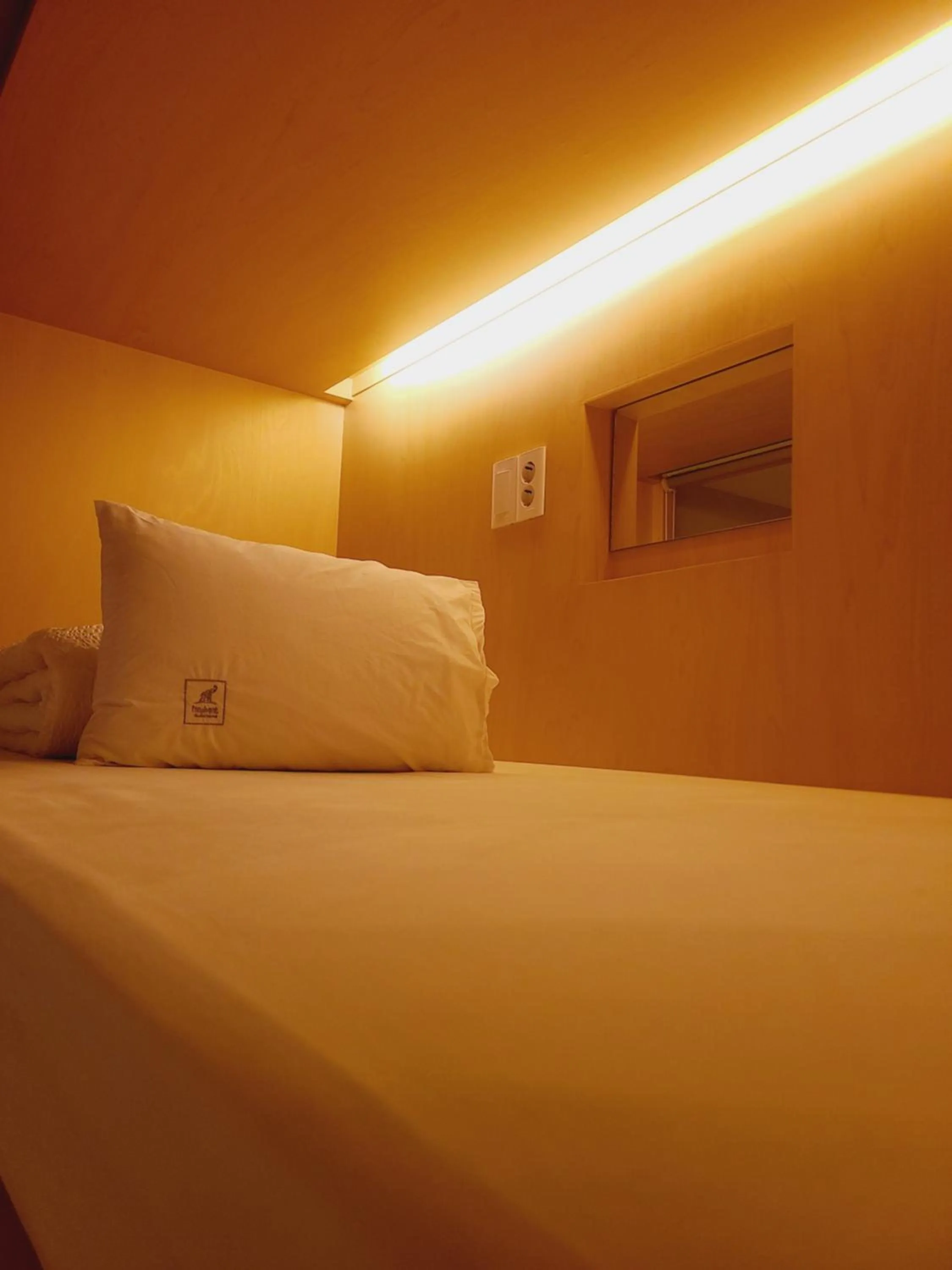 Bed in Elephant Hostel Nampo