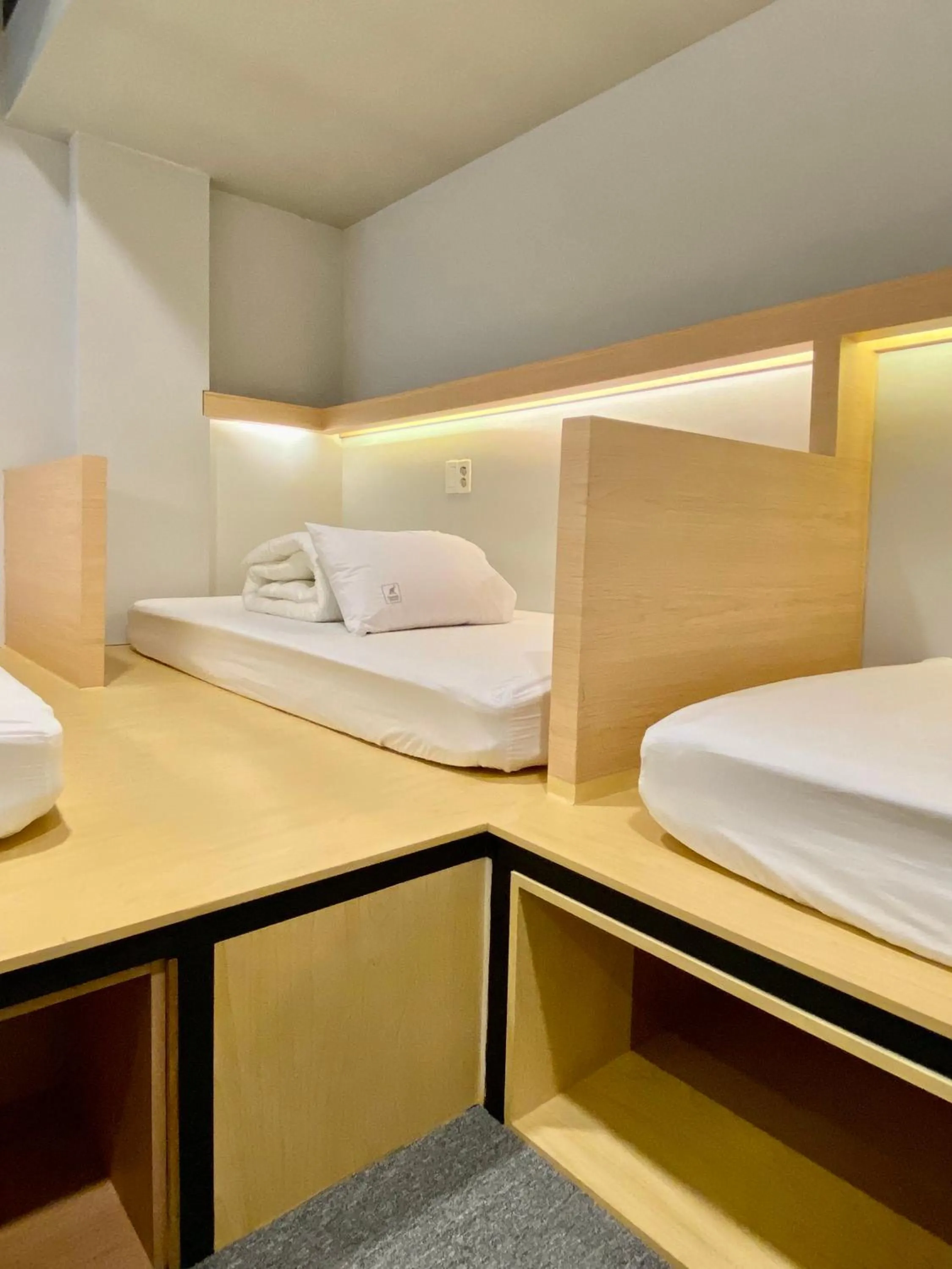 Bed in Elephant Hostel Nampo