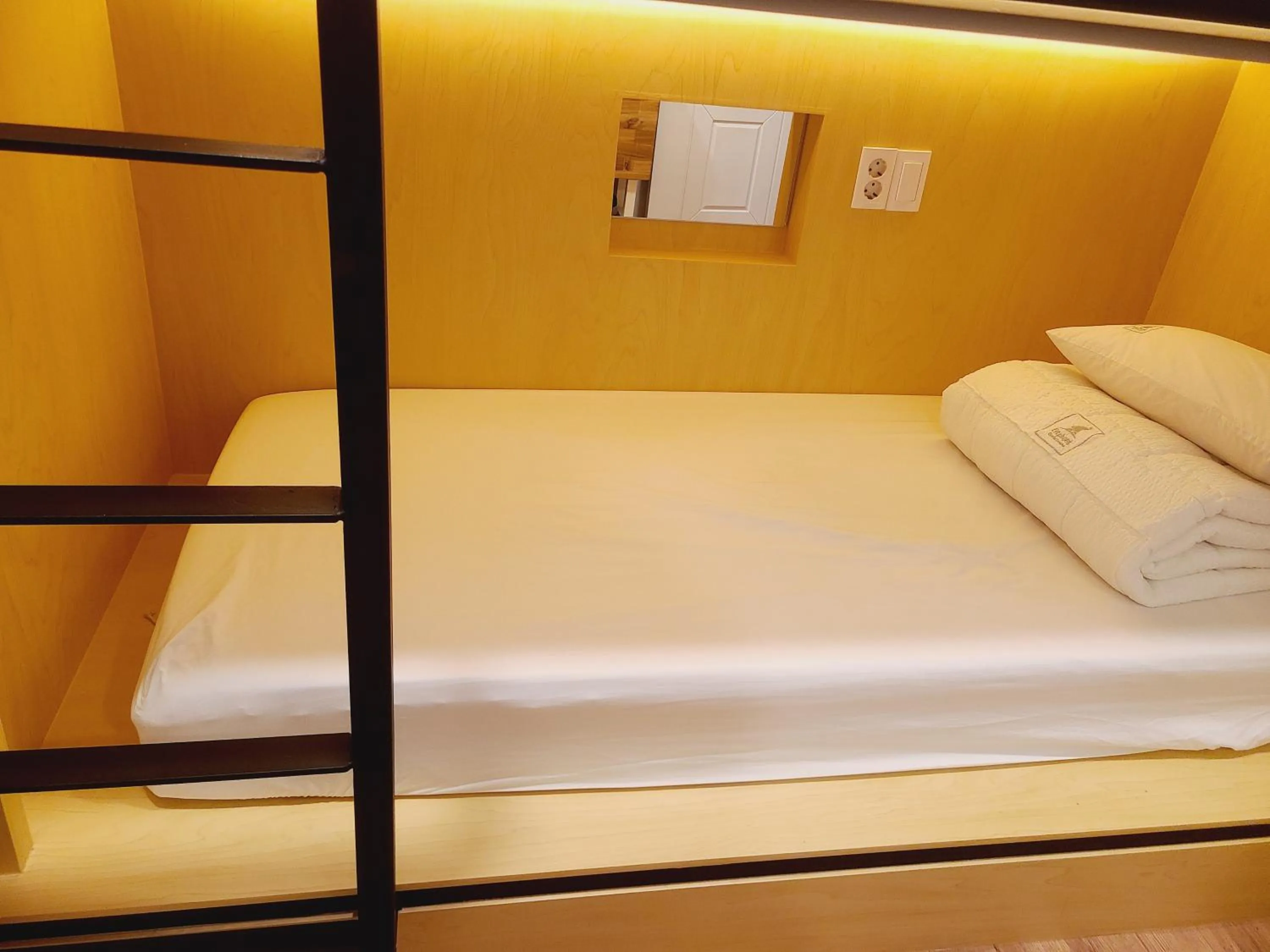 Bed in Elephant Hostel Nampo