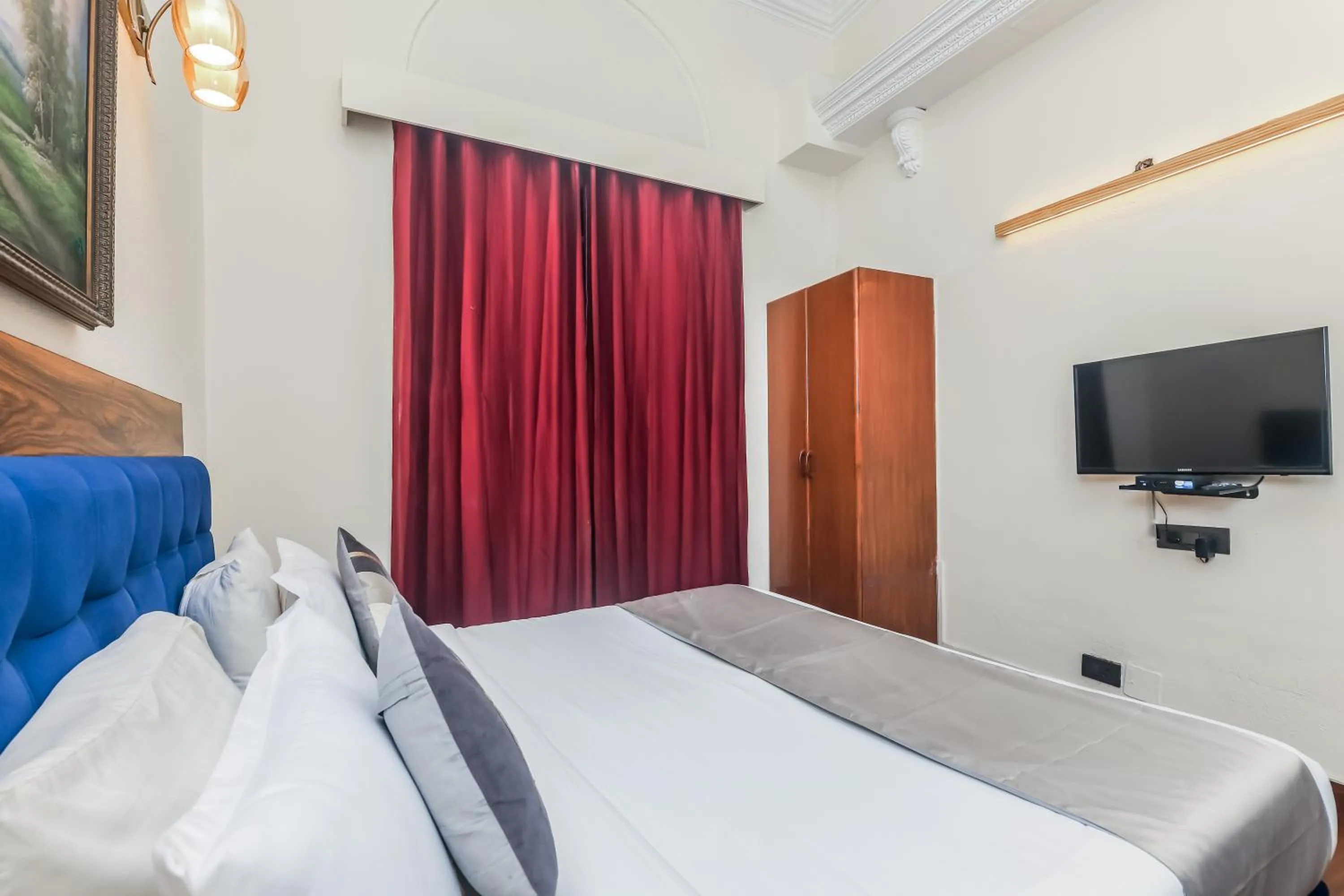 Bed in asar CP Outer Circle by Orion Hotels