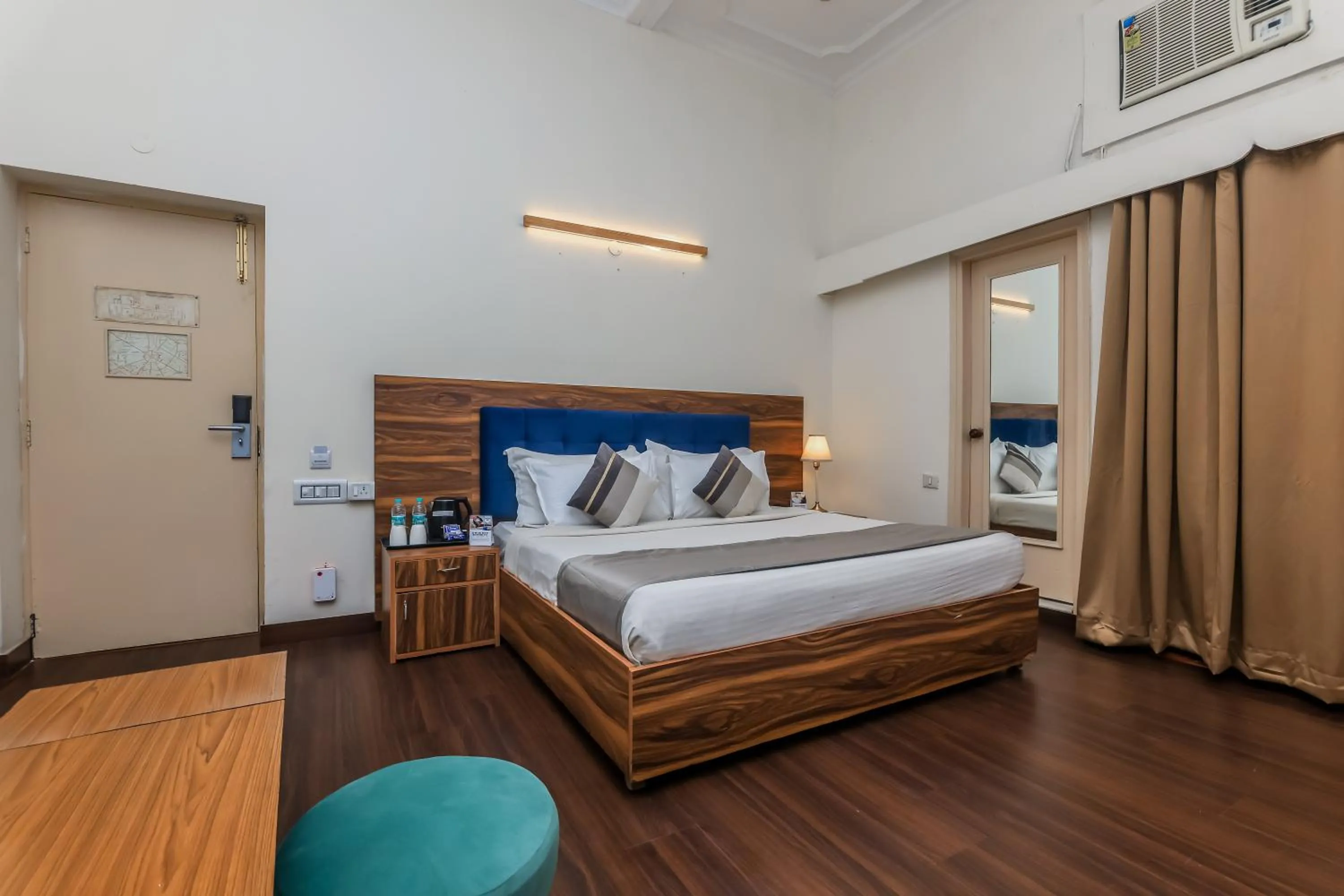 Bed in asar CP Outer Circle by Orion Hotels
