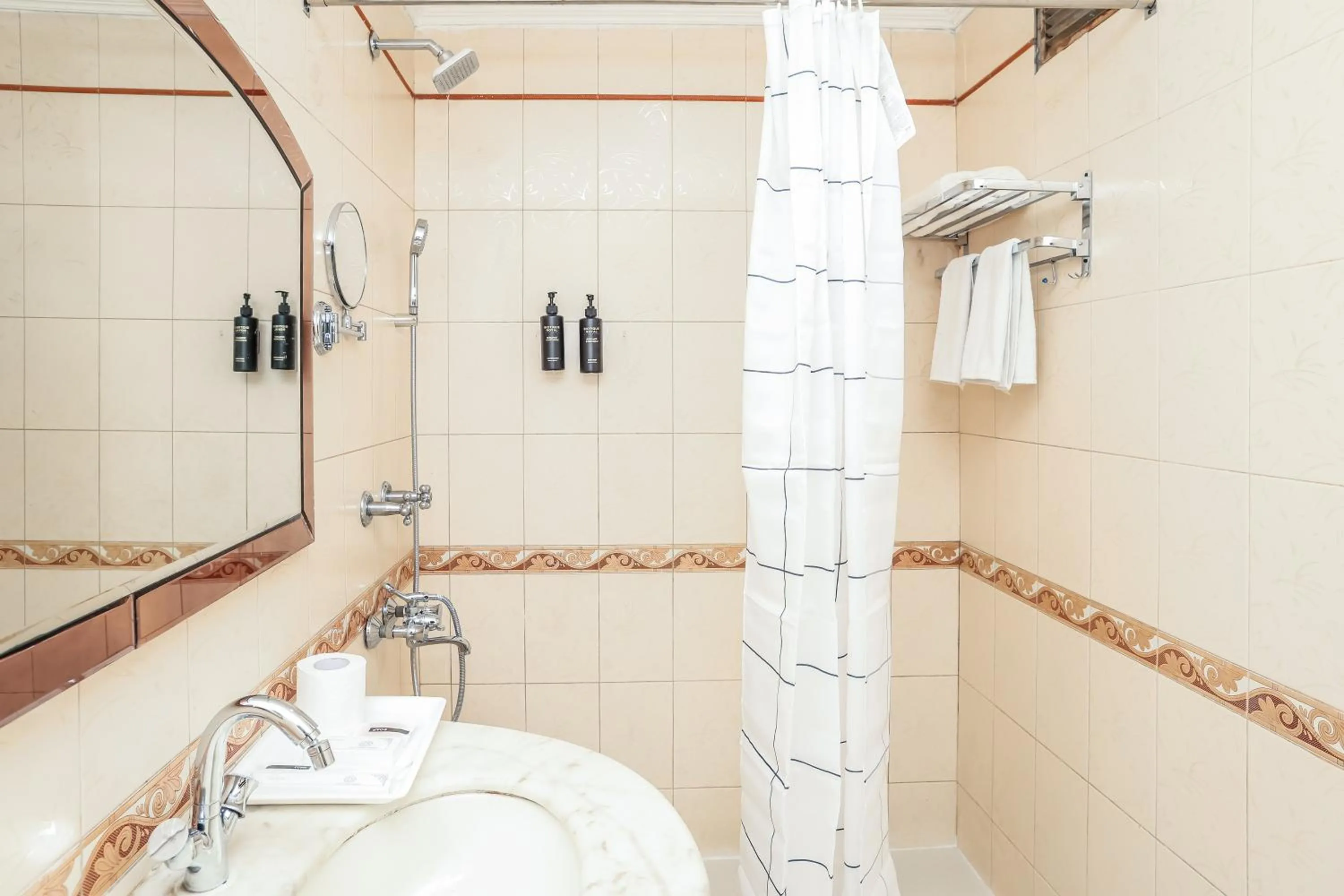 Shower in asar CP Outer Circle by Orion Hotels