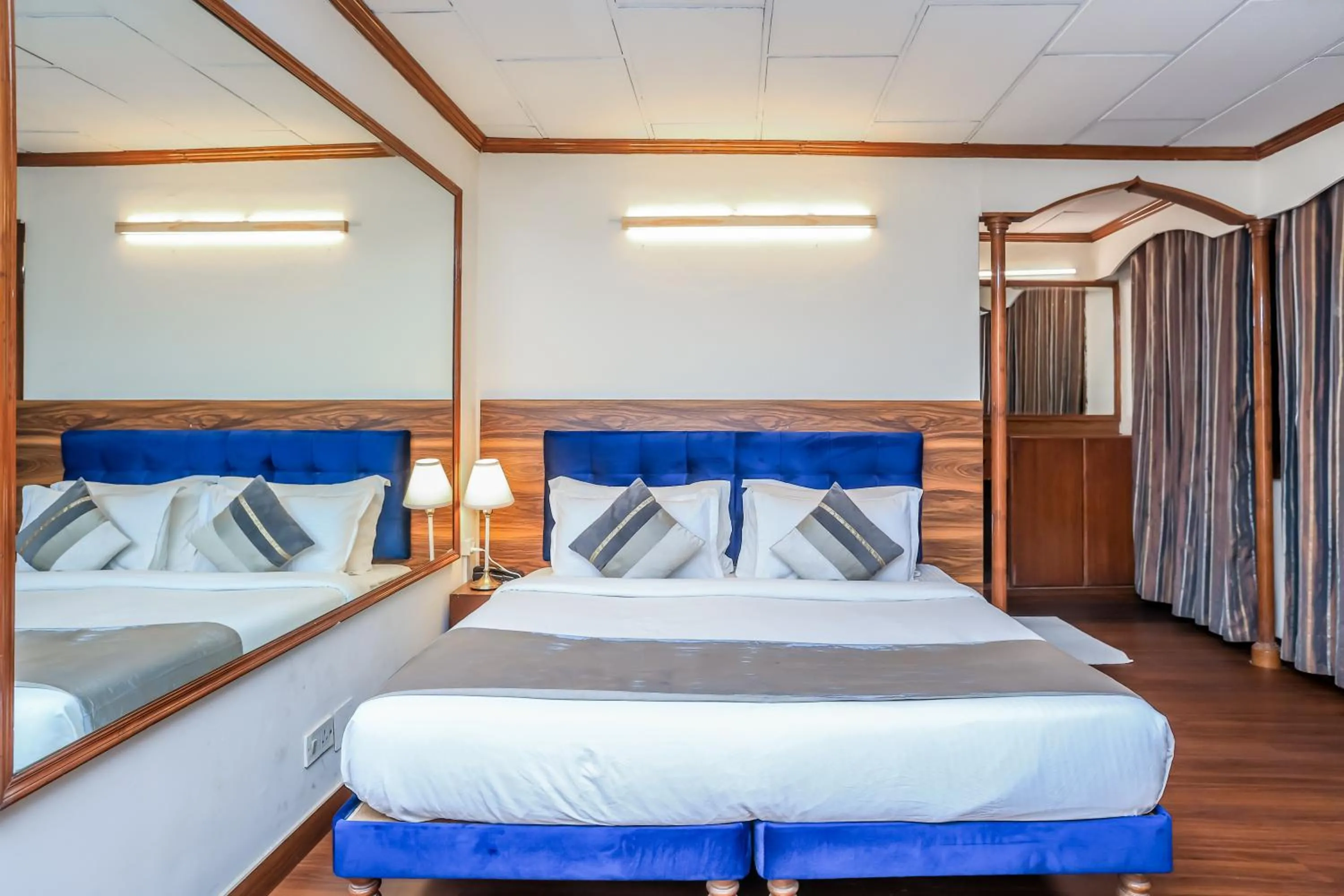 Bed in asar CP Outer Circle by Orion Hotels