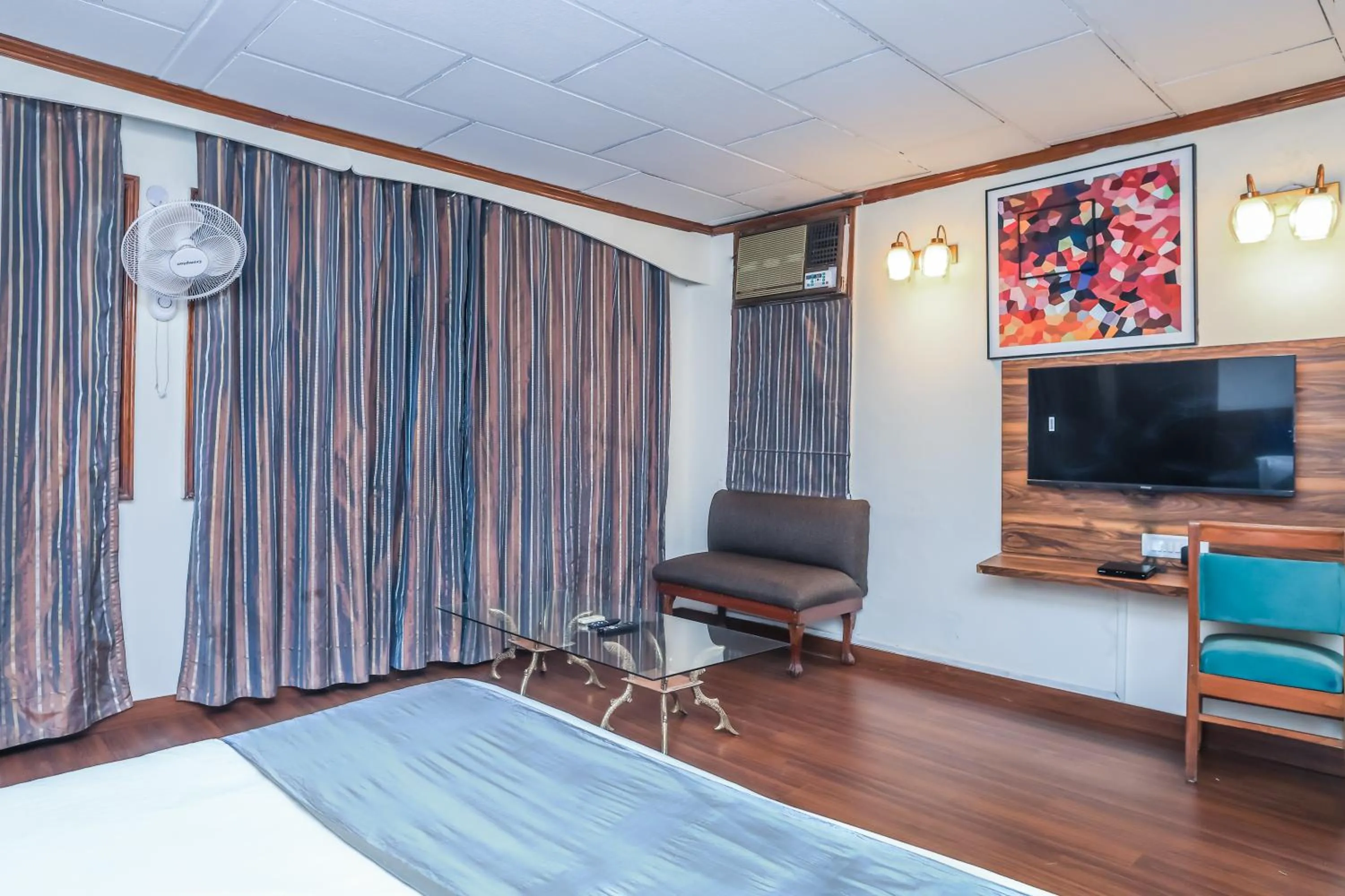 Bed in asar CP Outer Circle by Orion Hotels