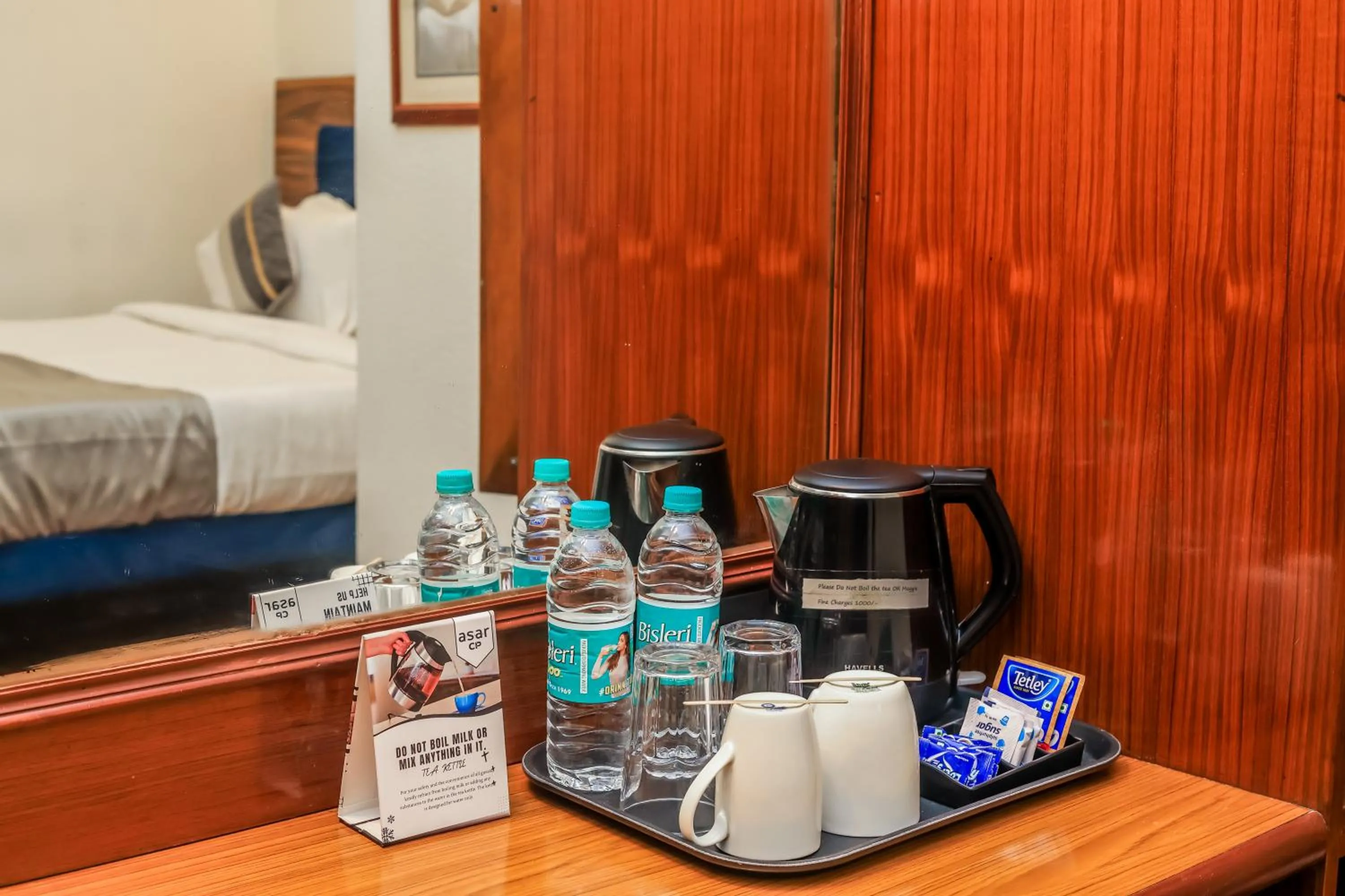 Bed in asar CP Outer Circle by Orion Hotels