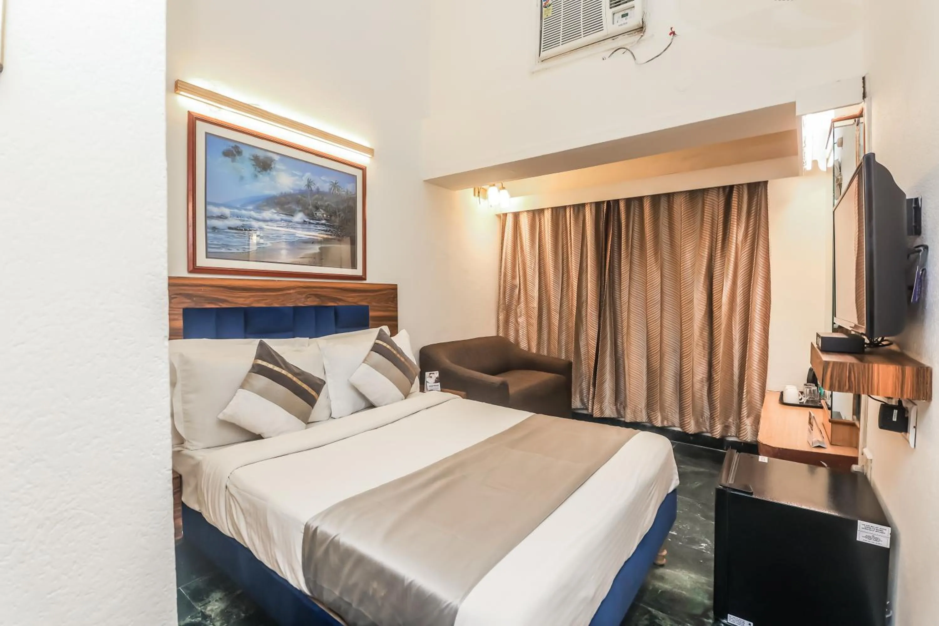 Bed in asar CP Outer Circle by Orion Hotels