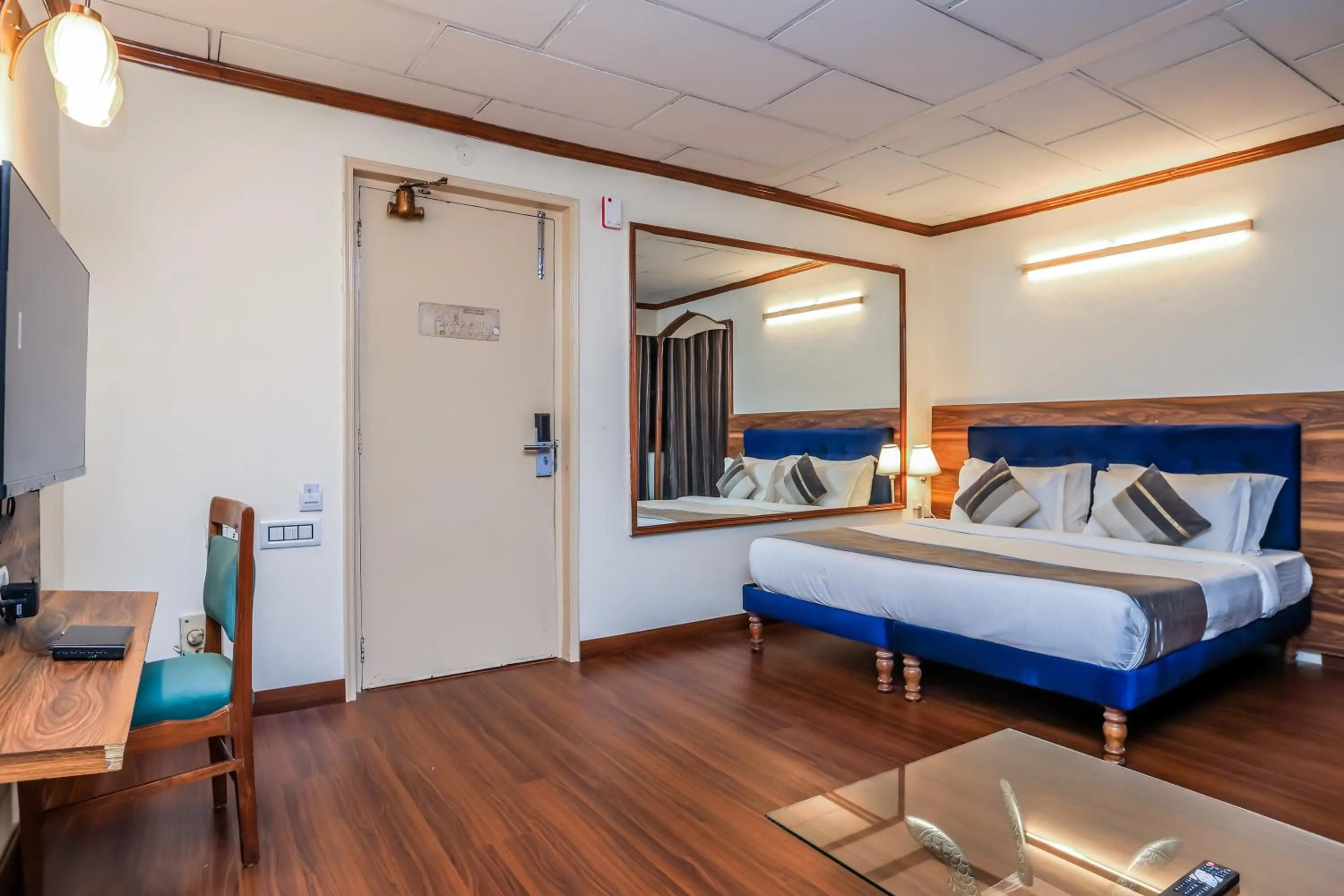 Bed in asar CP Outer Circle by Orion Hotels