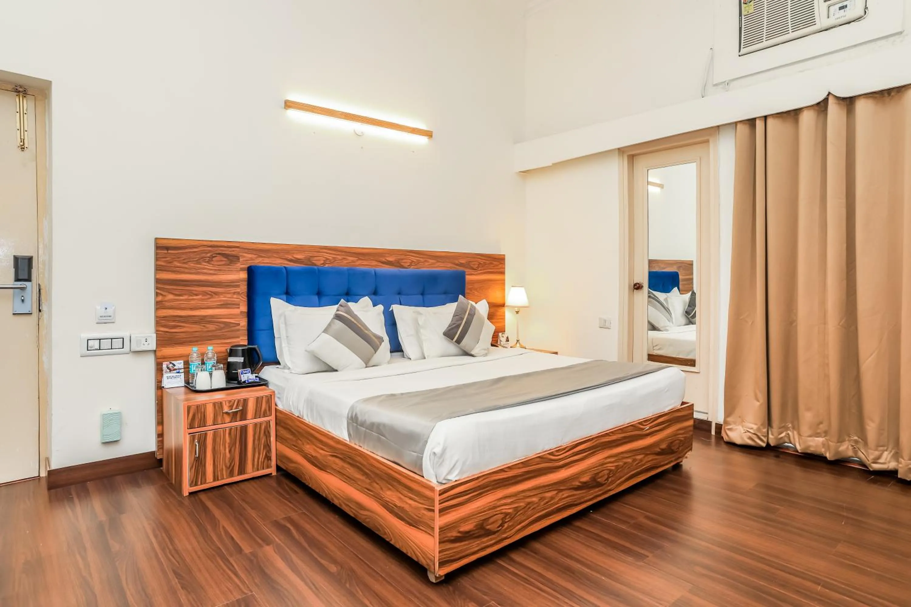 Bed in asar CP Outer Circle by Orion Hotels