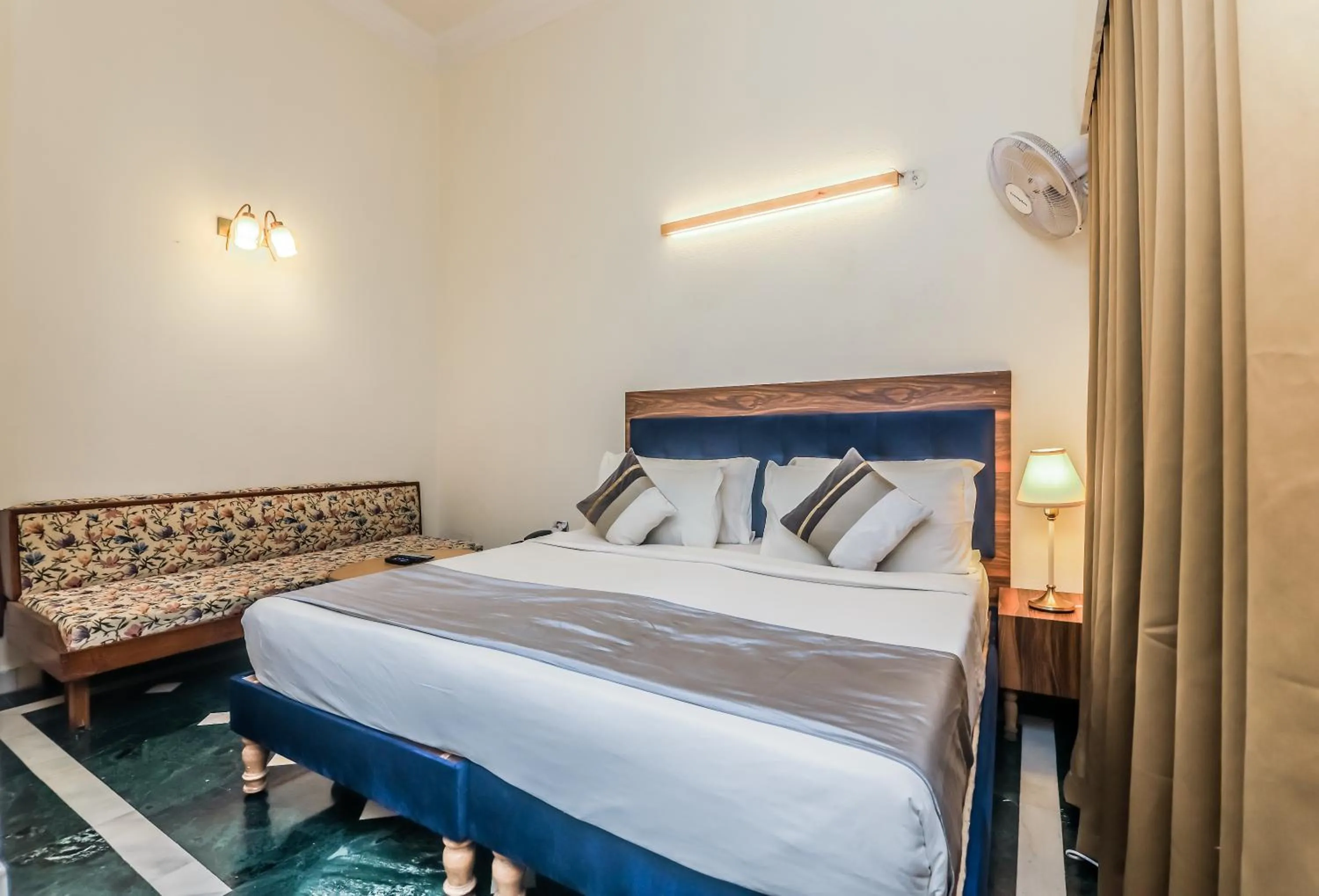 Bed in asar CP Outer Circle by Orion Hotels