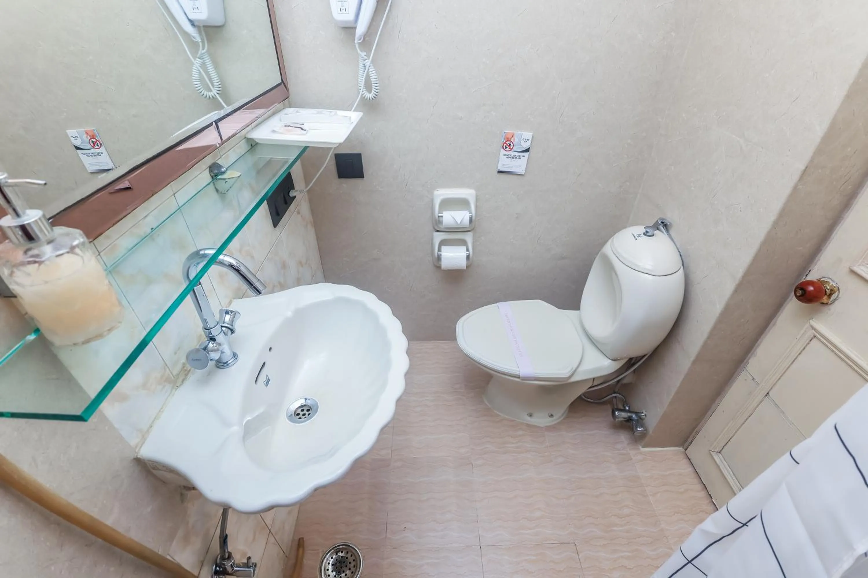 Shower in asar CP Outer Circle by Orion Hotels