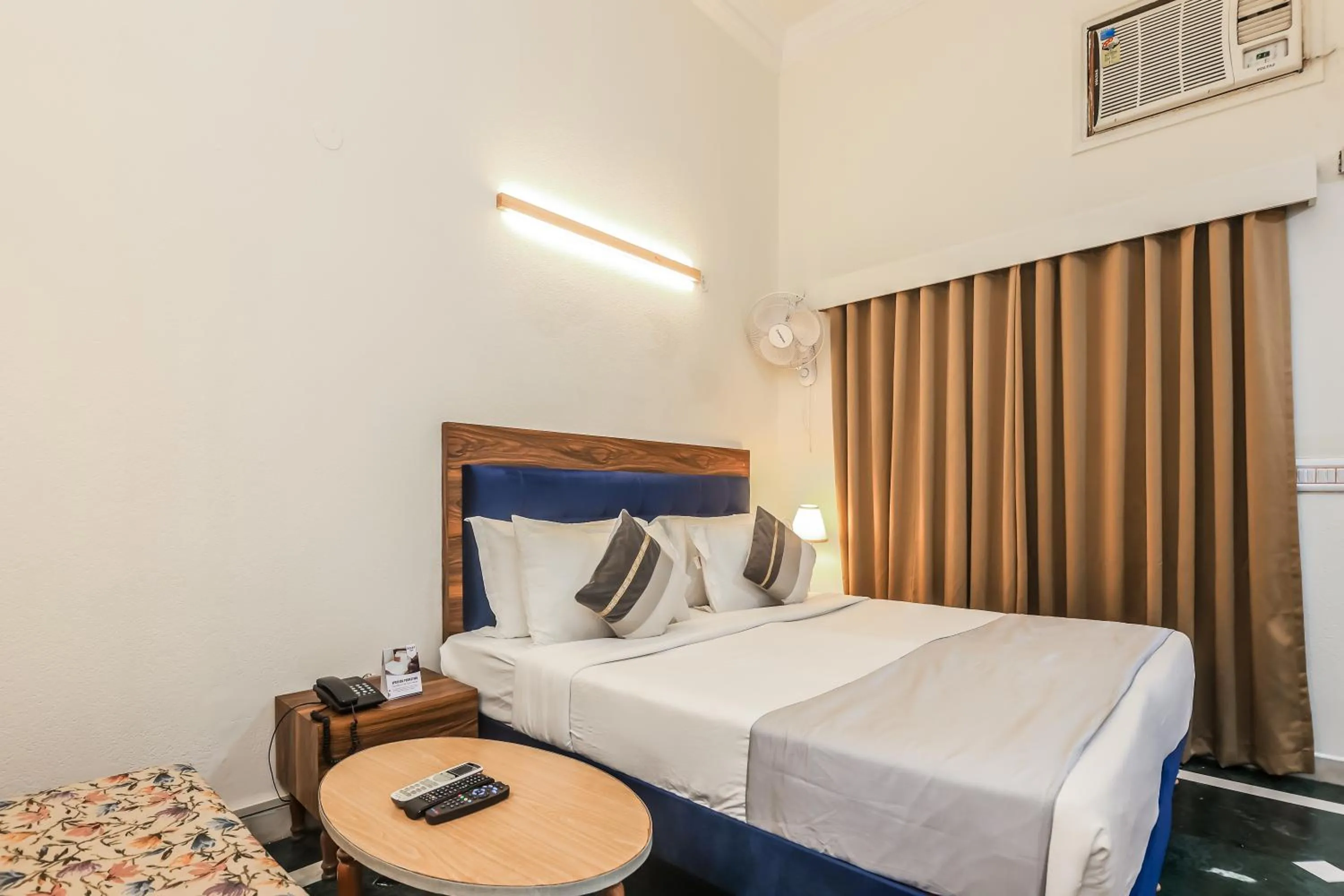 Bed in asar CP Outer Circle by Orion Hotels