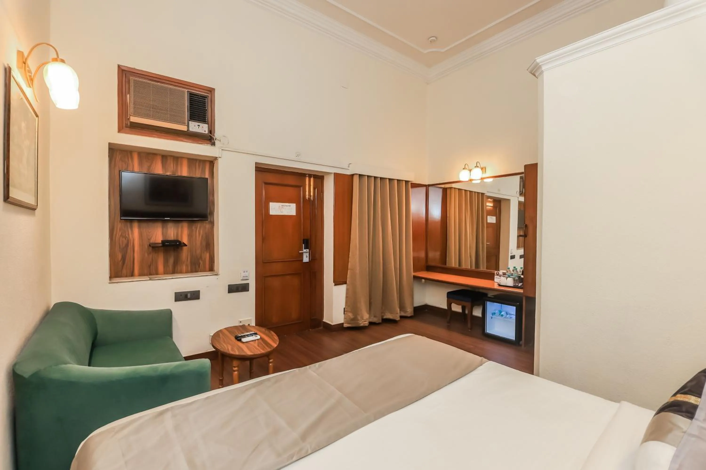 Bed in asar CP Outer Circle by Orion Hotels