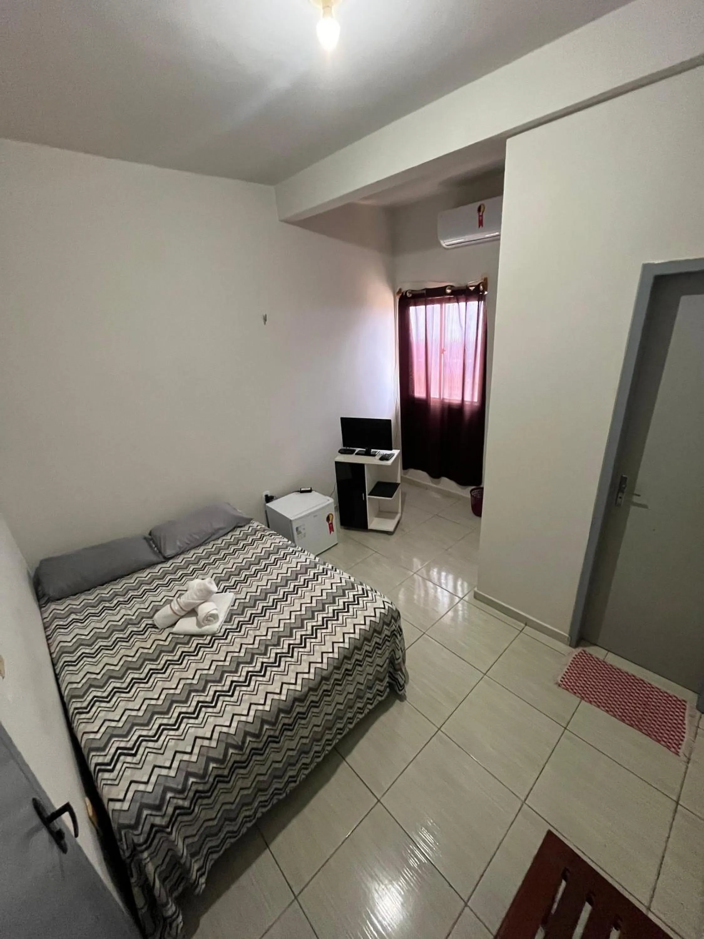 Bed in Pousada santos