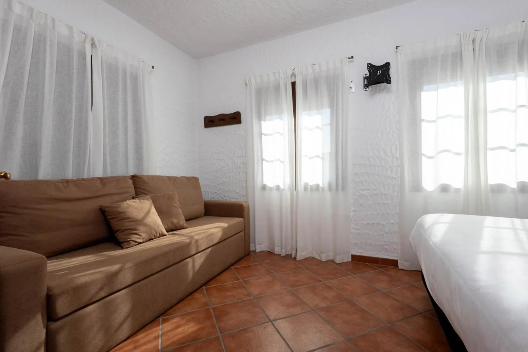 Bedroom in Tugasa Hotel y Apartamentos rurales La Posada