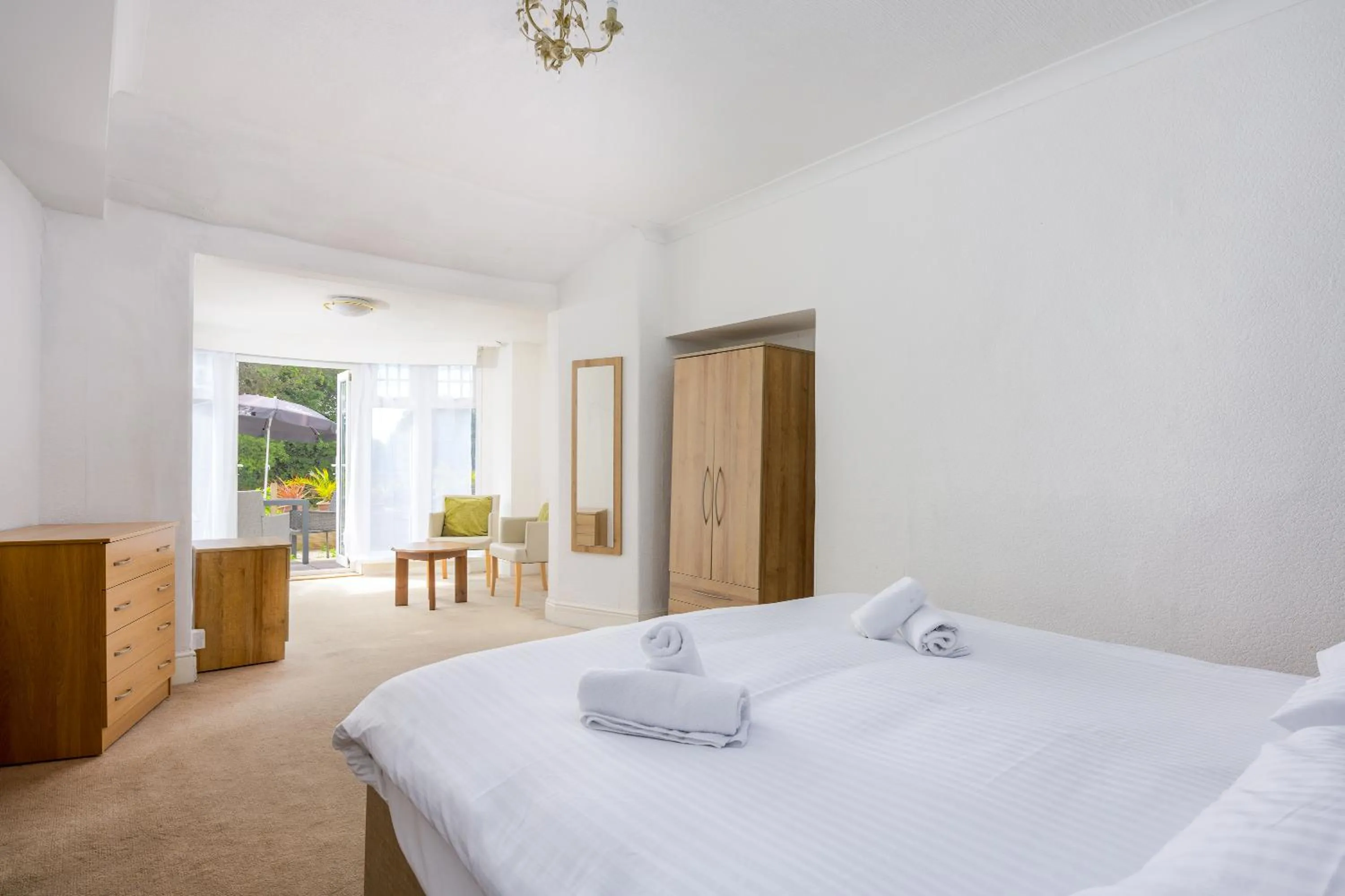 Bed in Abbey Lawn Hotel