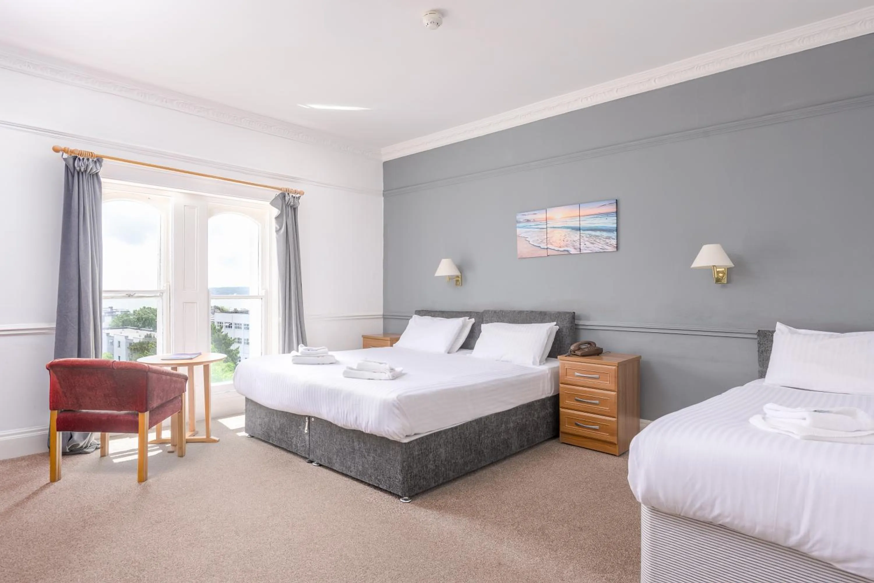 Bed in Abbey Lawn Hotel