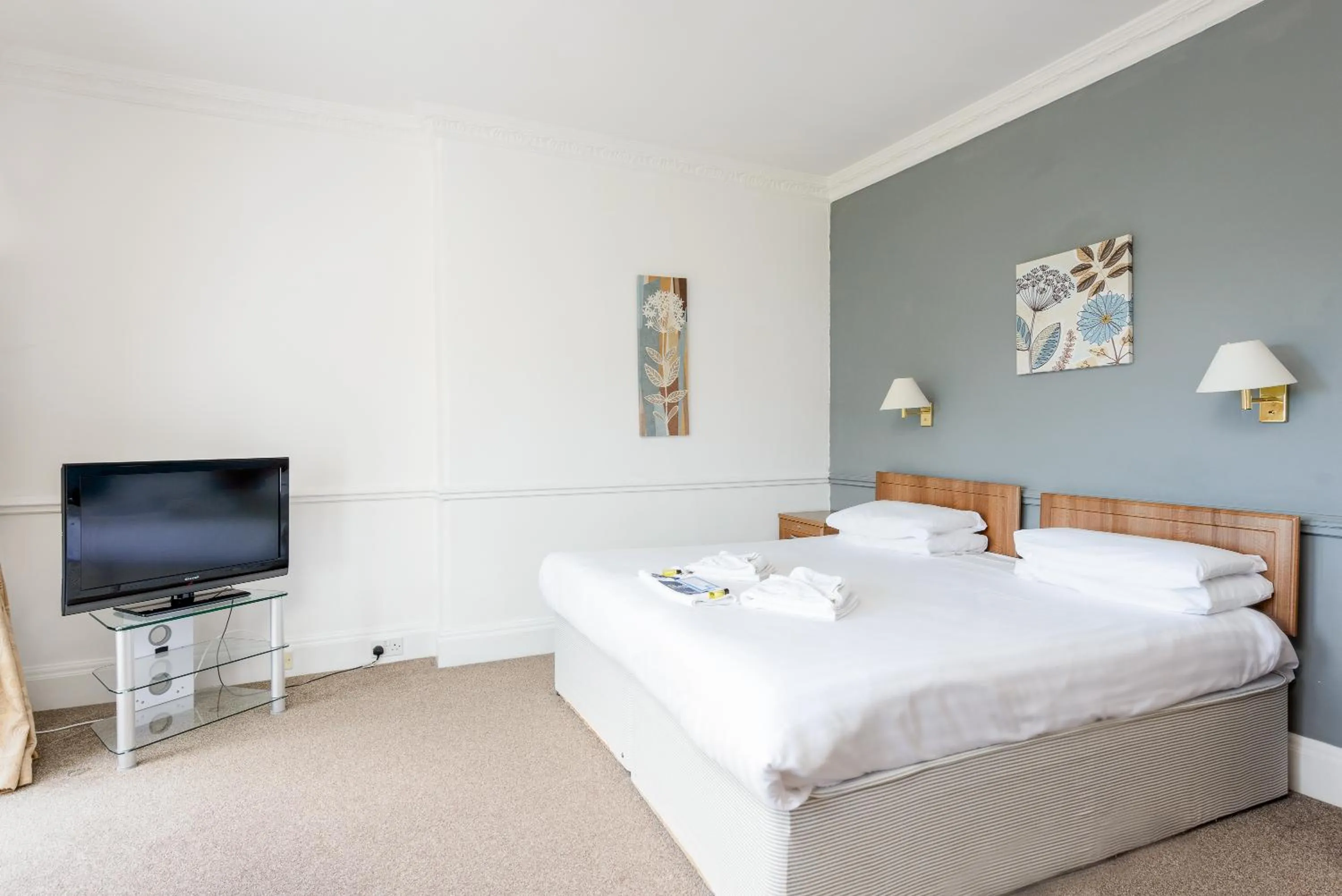 Bed in Abbey Lawn Hotel