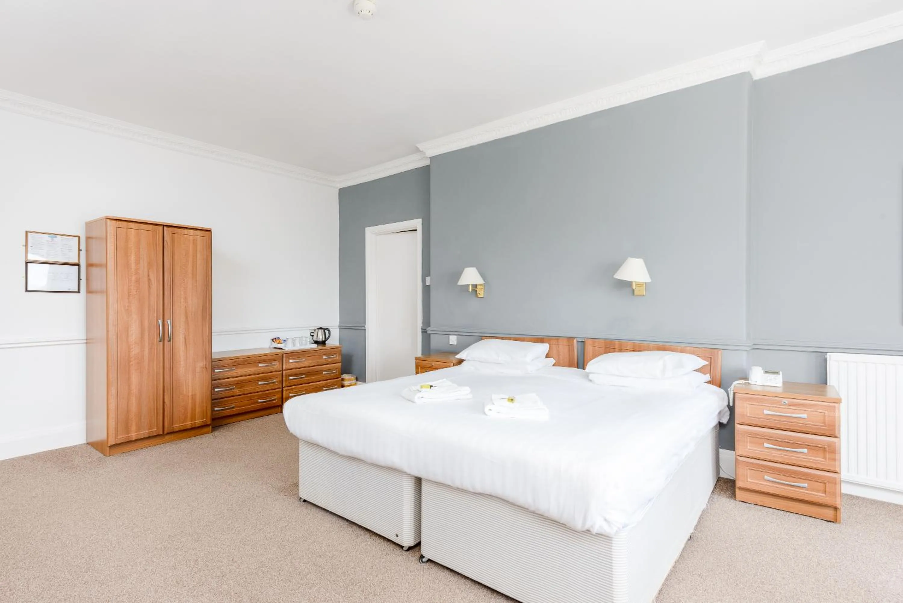 Bed in Abbey Lawn Hotel