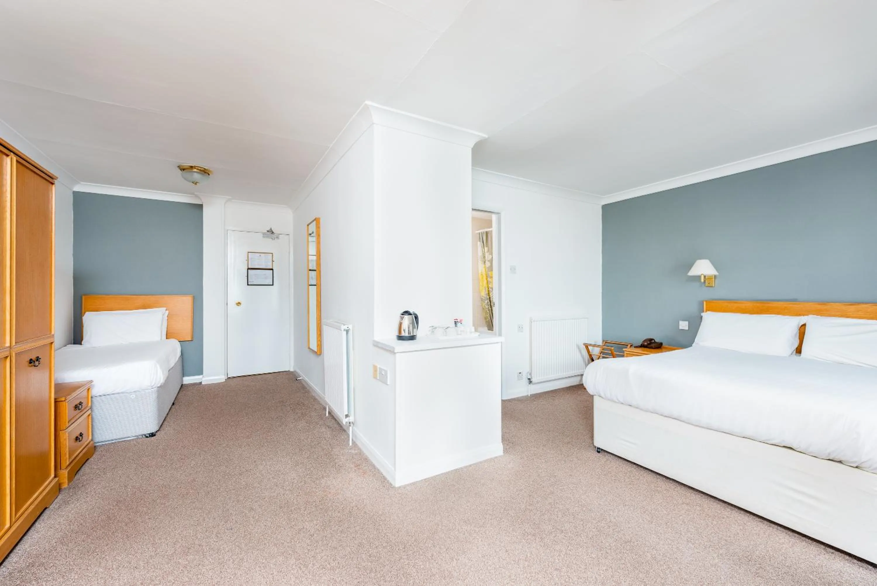 Bed in Abbey Lawn Hotel