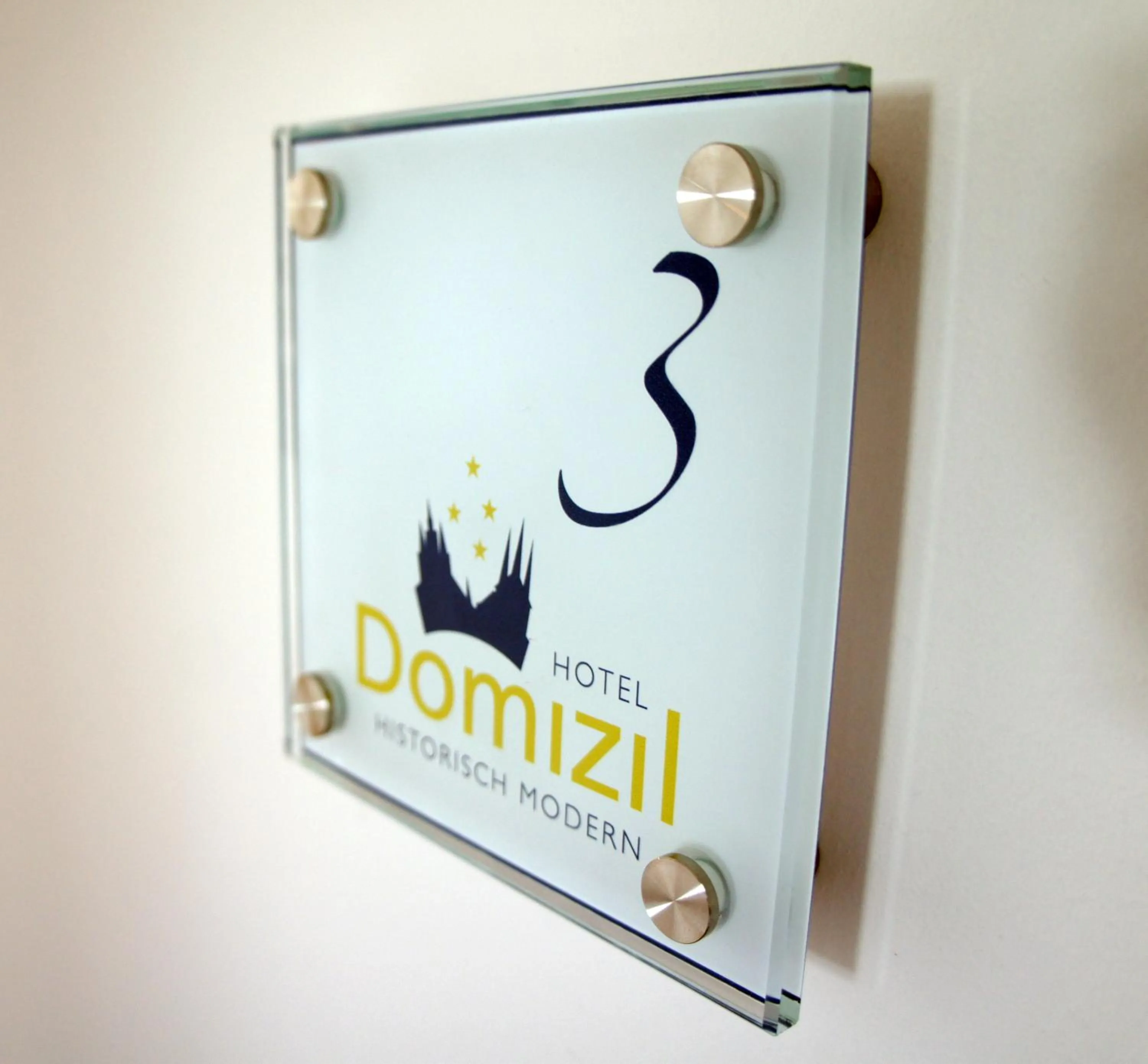 Property logo or sign in Hotel Domizil