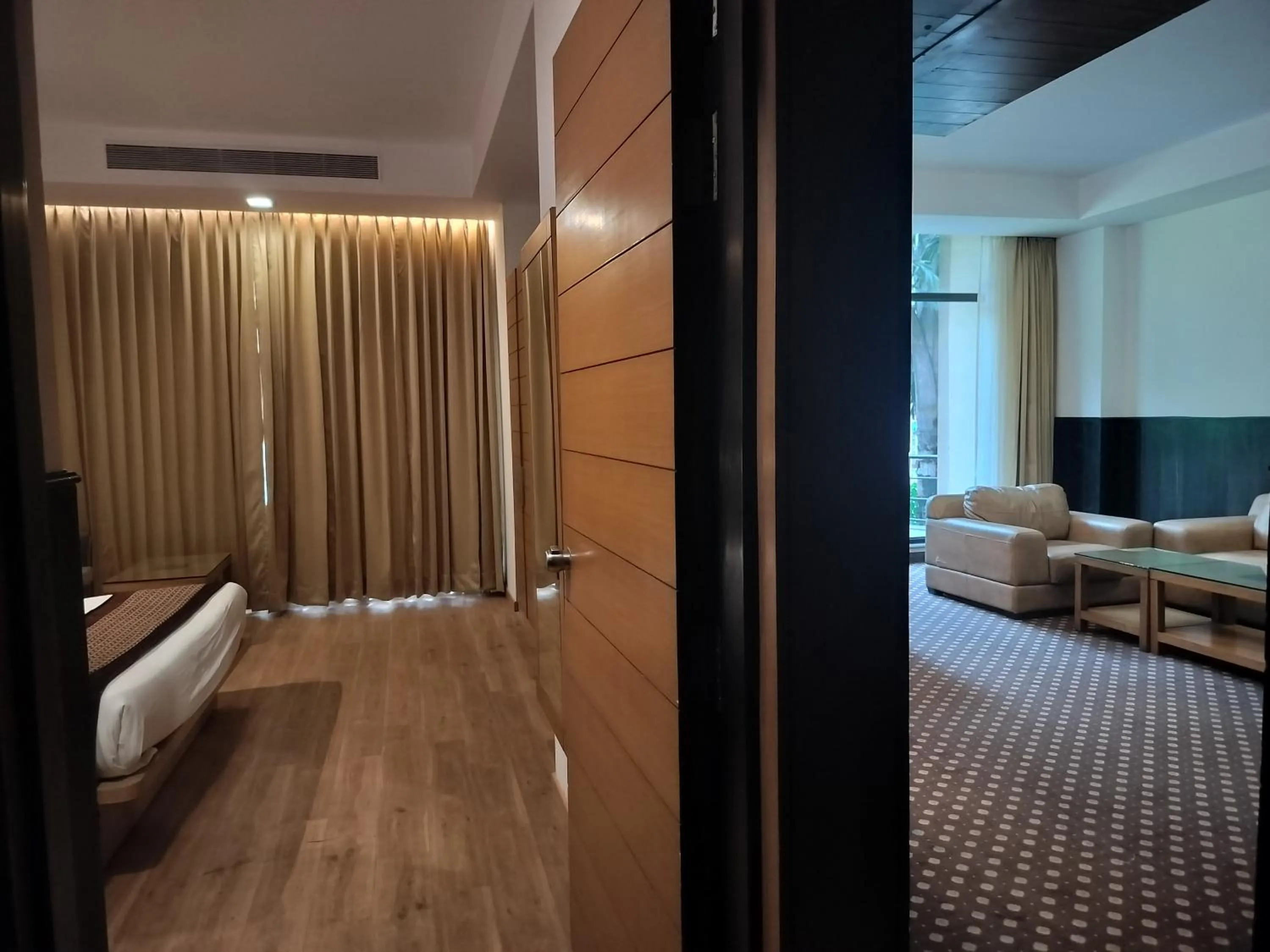 Living room, Bed in Stellar Resorts By Bel-La Monde, Rajokri, Near IGI Airport, Delhi