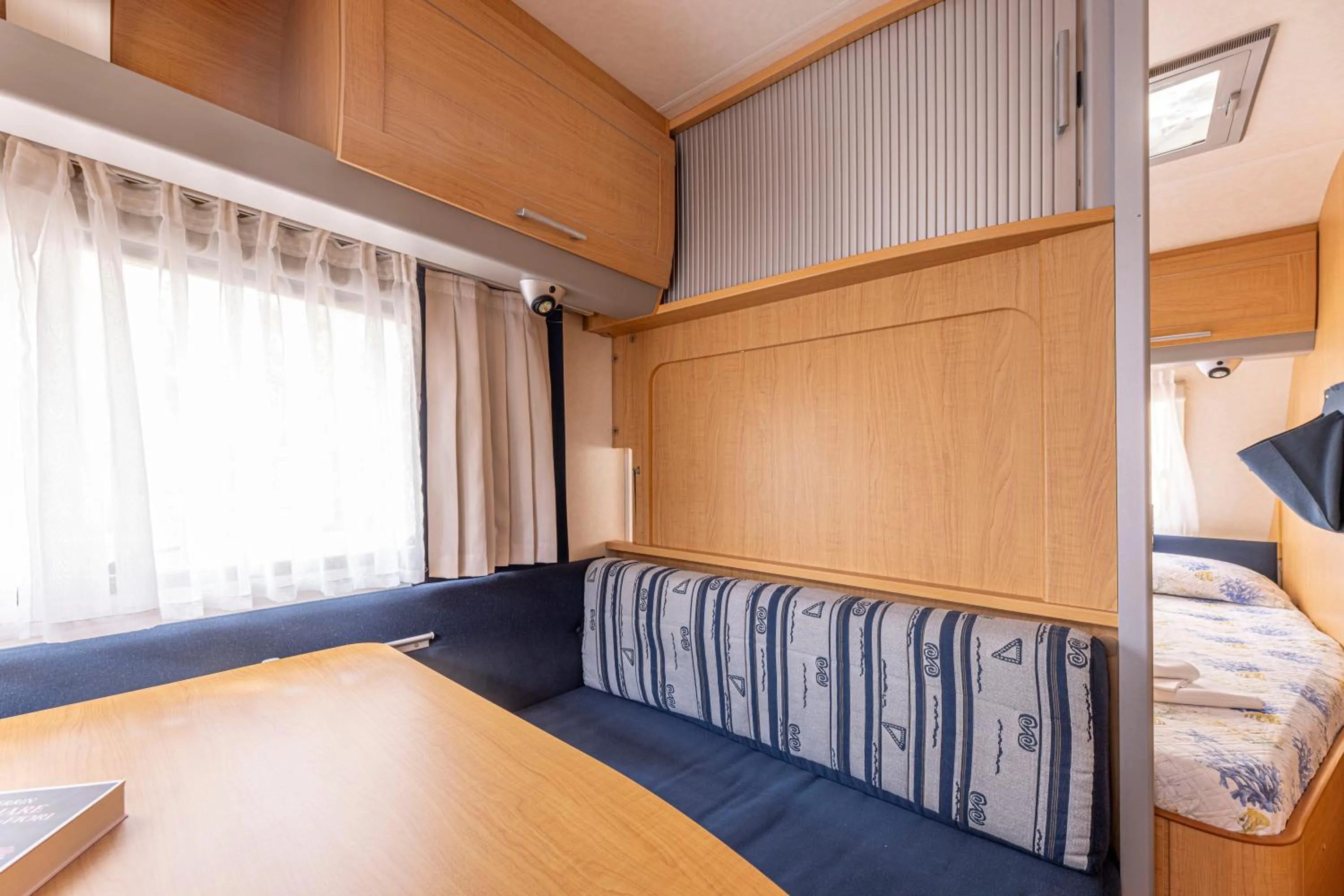 Living room, Bed in Camping Village Le Calanchiole