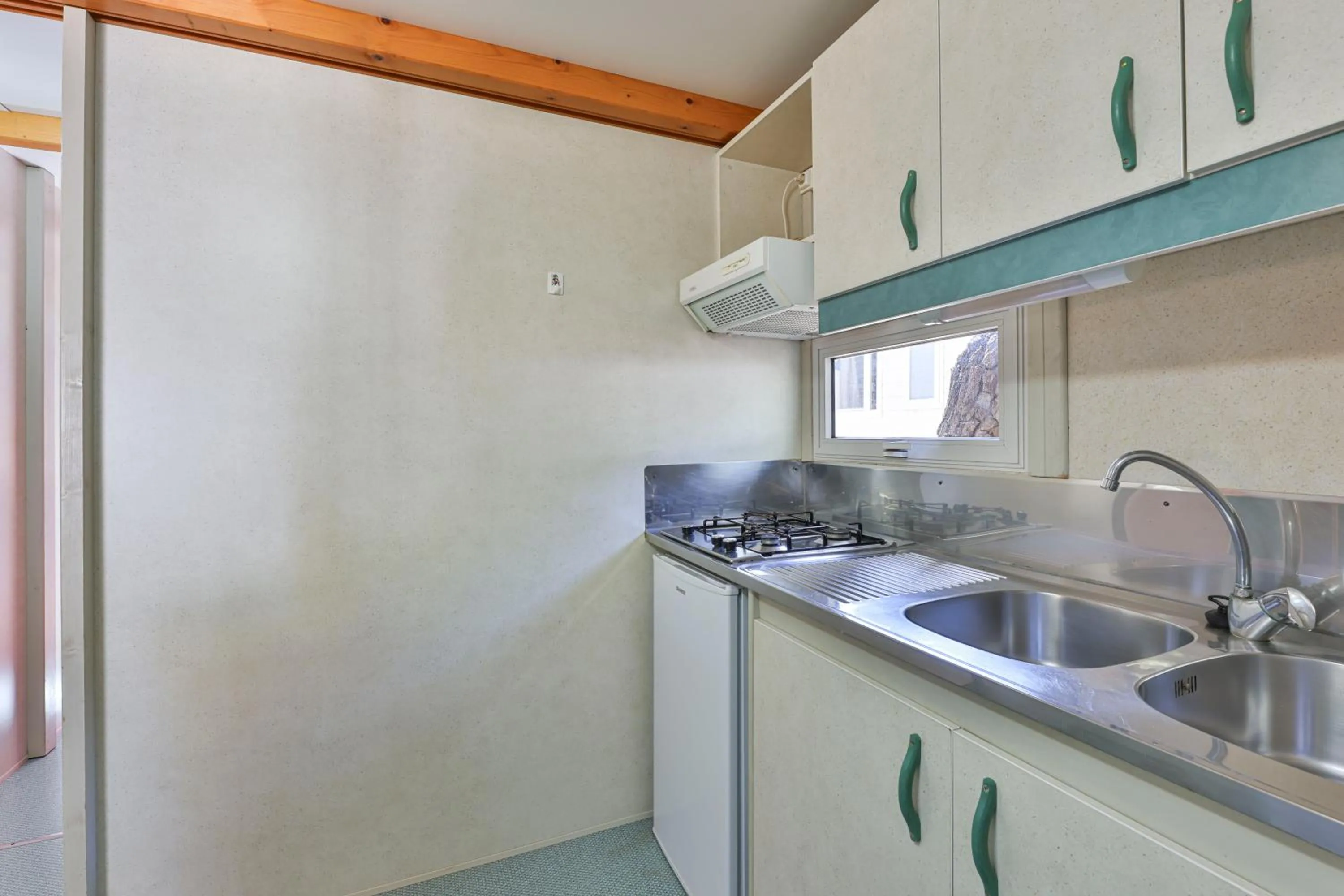 Kitchen or kitchenette in Camping Village Le Calanchiole