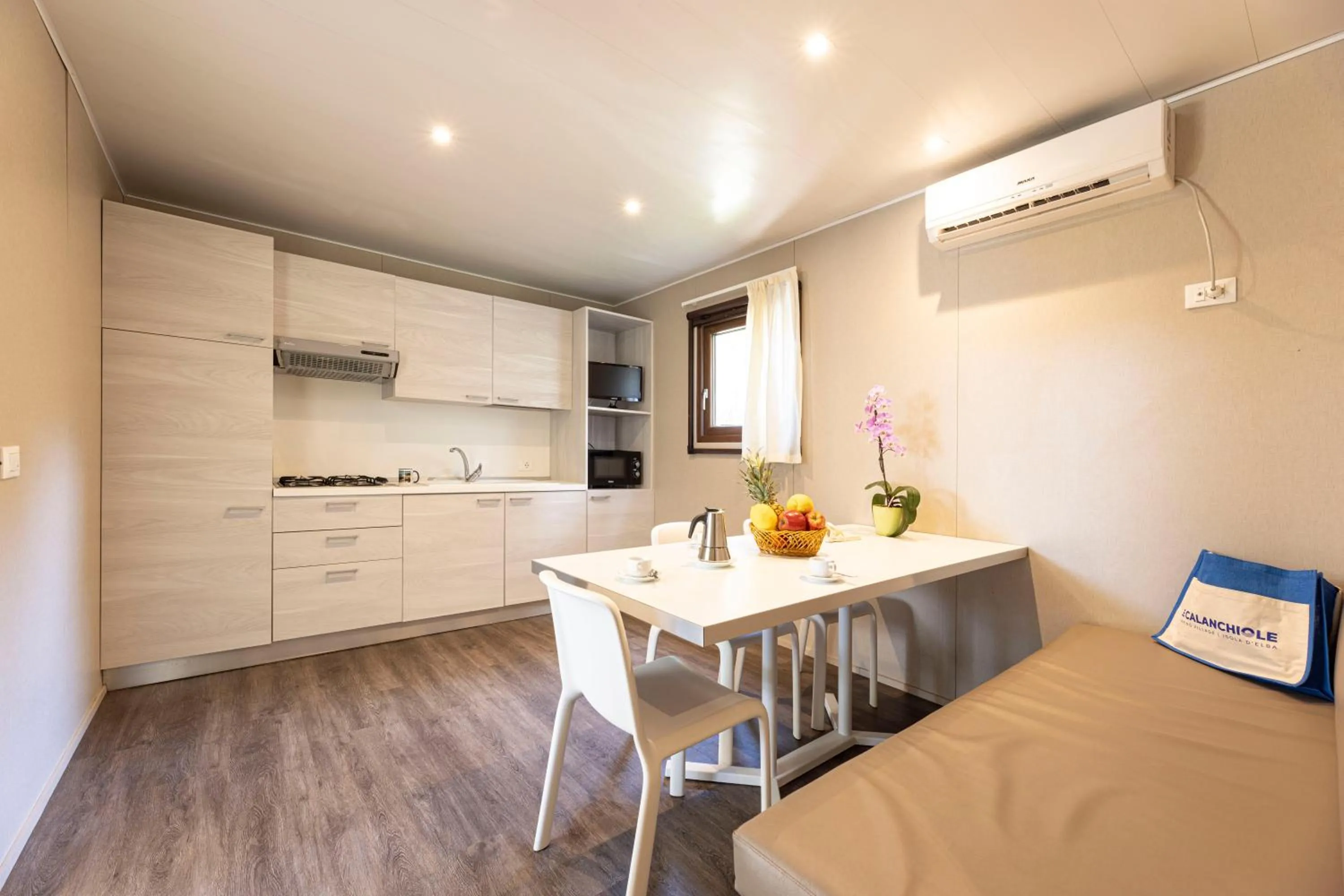 Kitchen or kitchenette in Camping Village Le Calanchiole