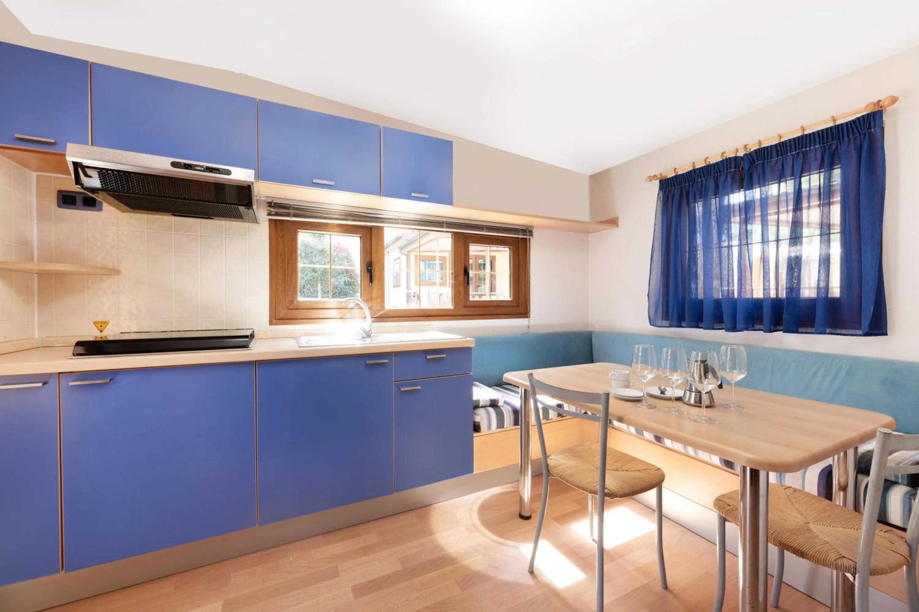 Kitchen or kitchenette in Camping Village Le Calanchiole