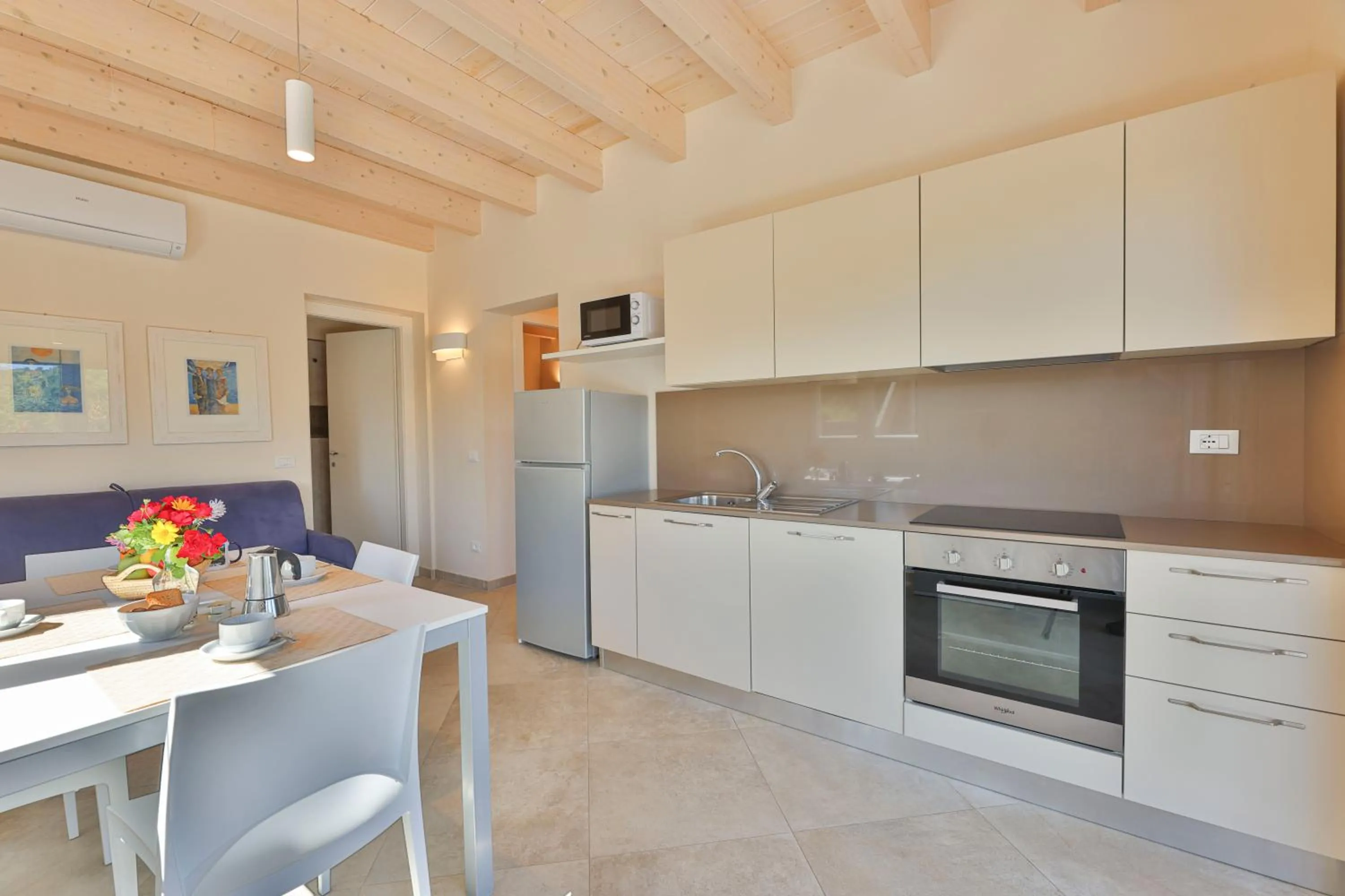 Kitchen or kitchenette in Camping Village Le Calanchiole