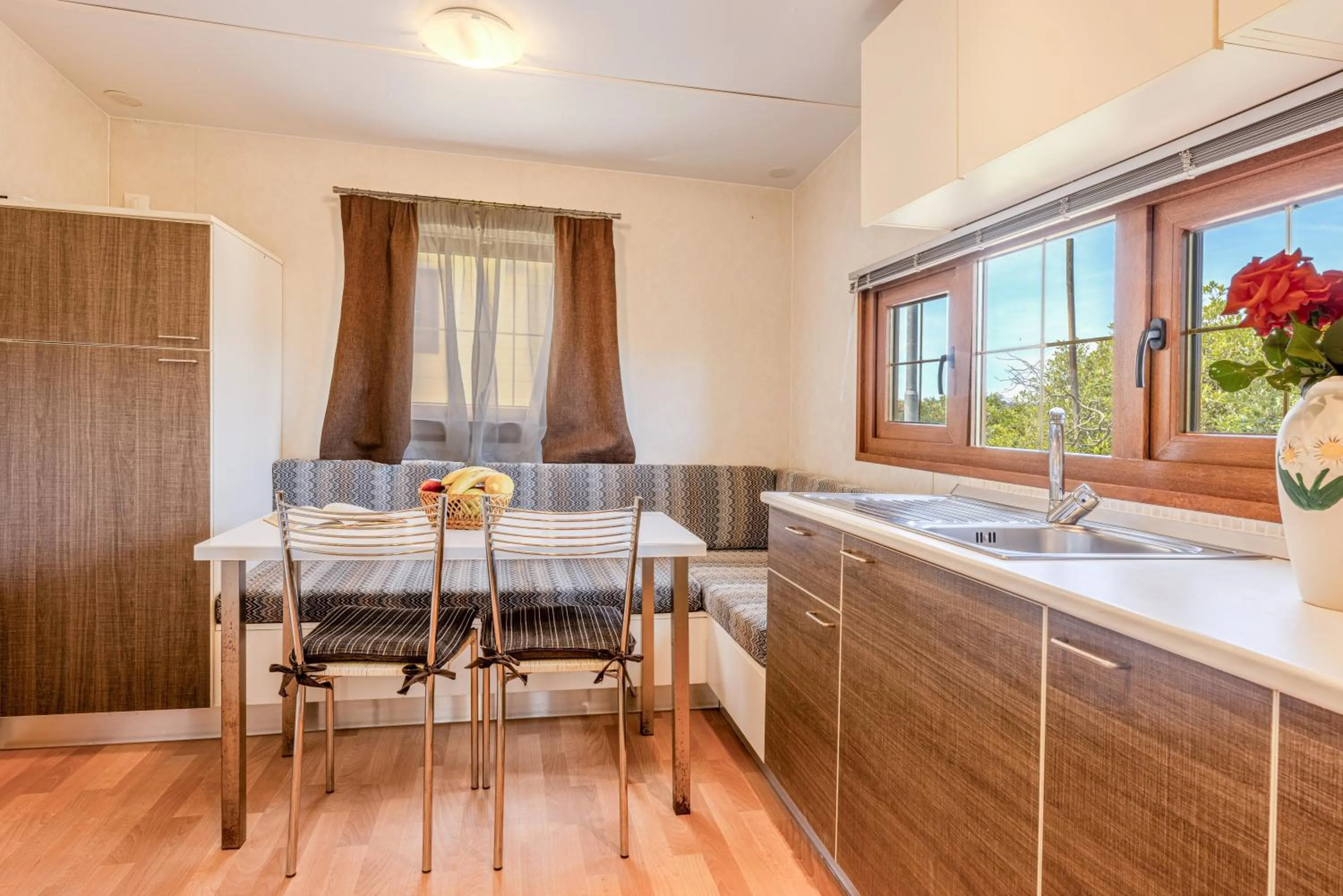Kitchen or kitchenette in Camping Village Le Calanchiole