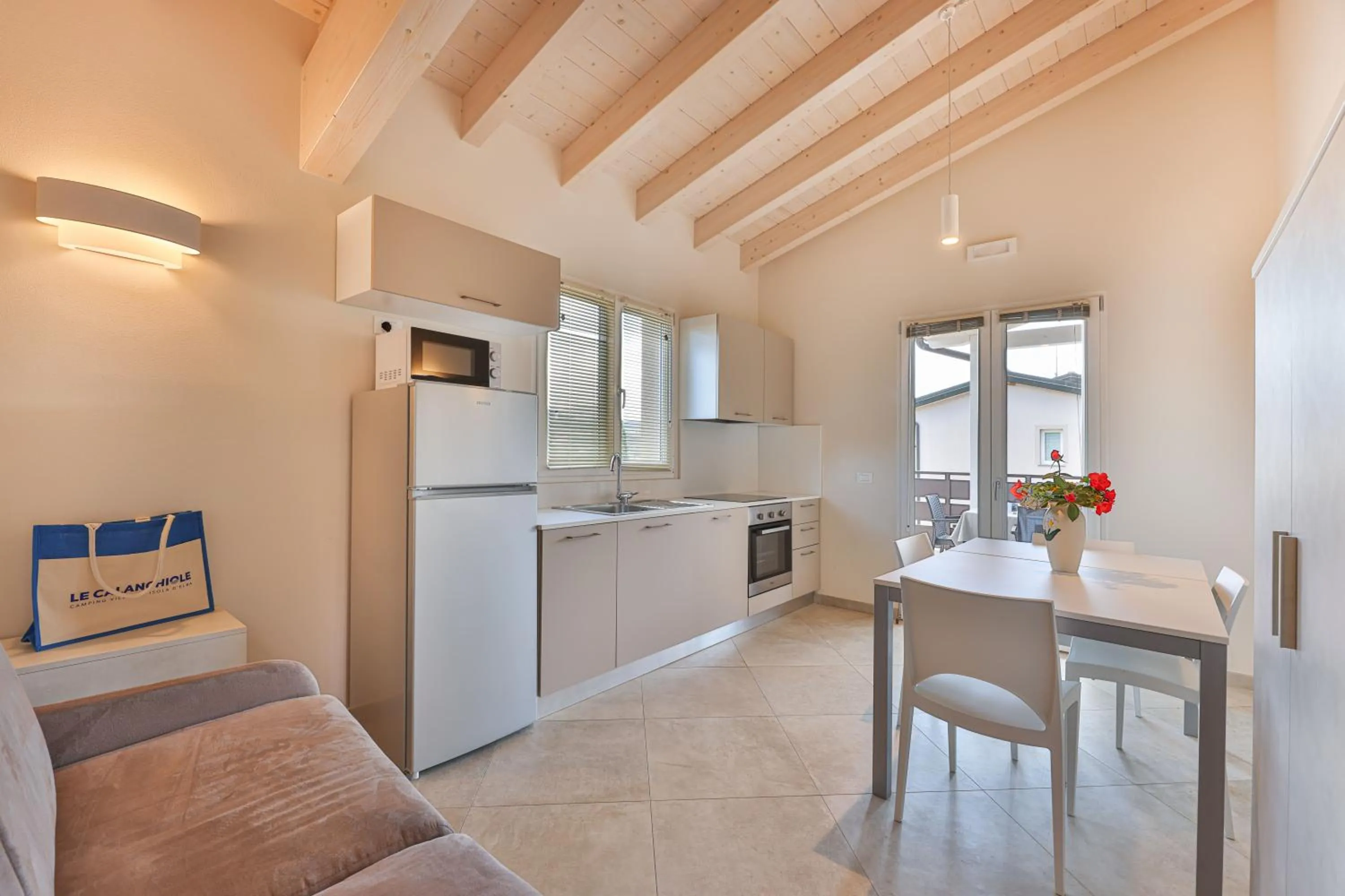 Kitchen or kitchenette in Camping Village Le Calanchiole