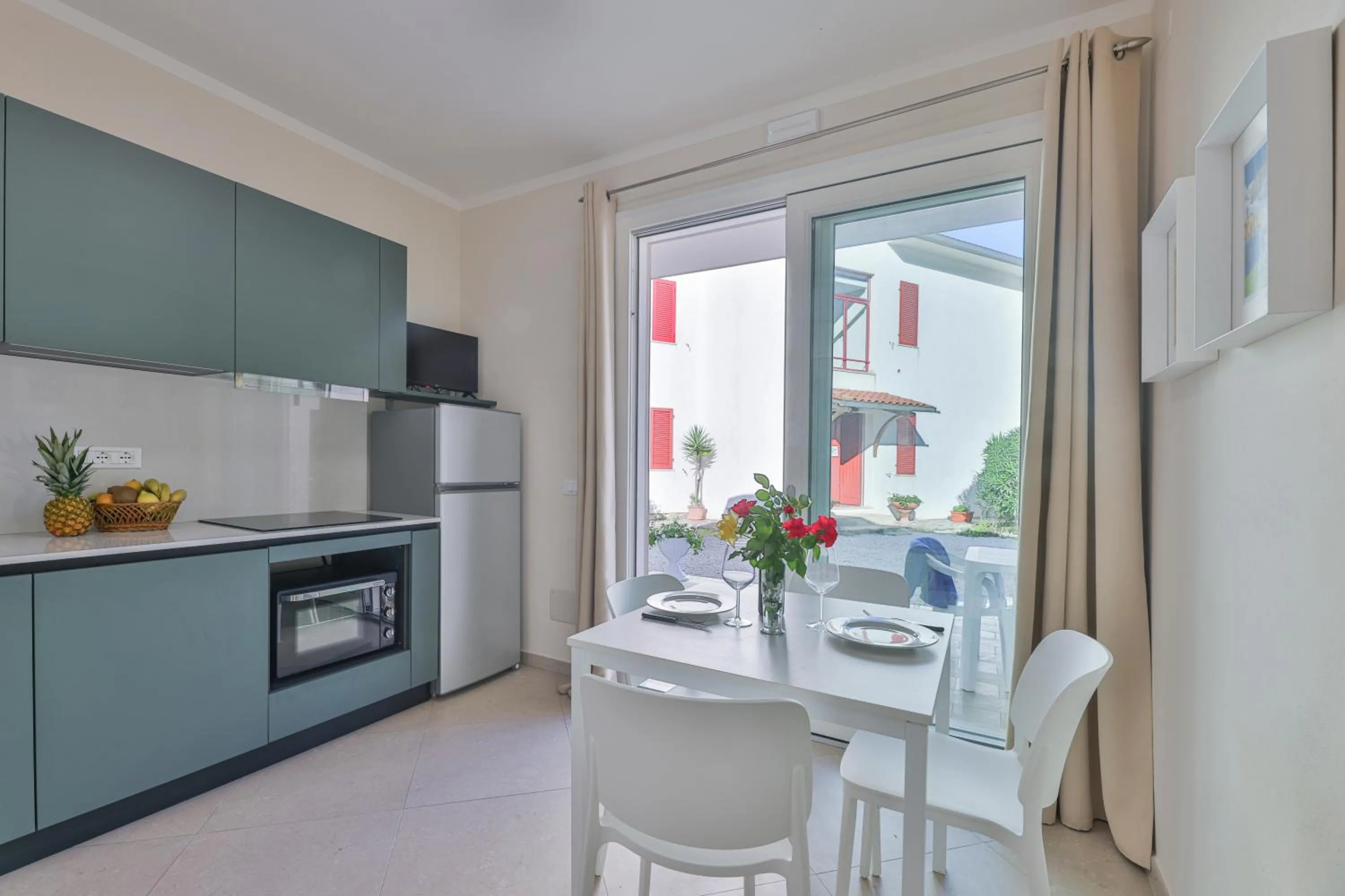 Kitchen or kitchenette in Camping Village Le Calanchiole