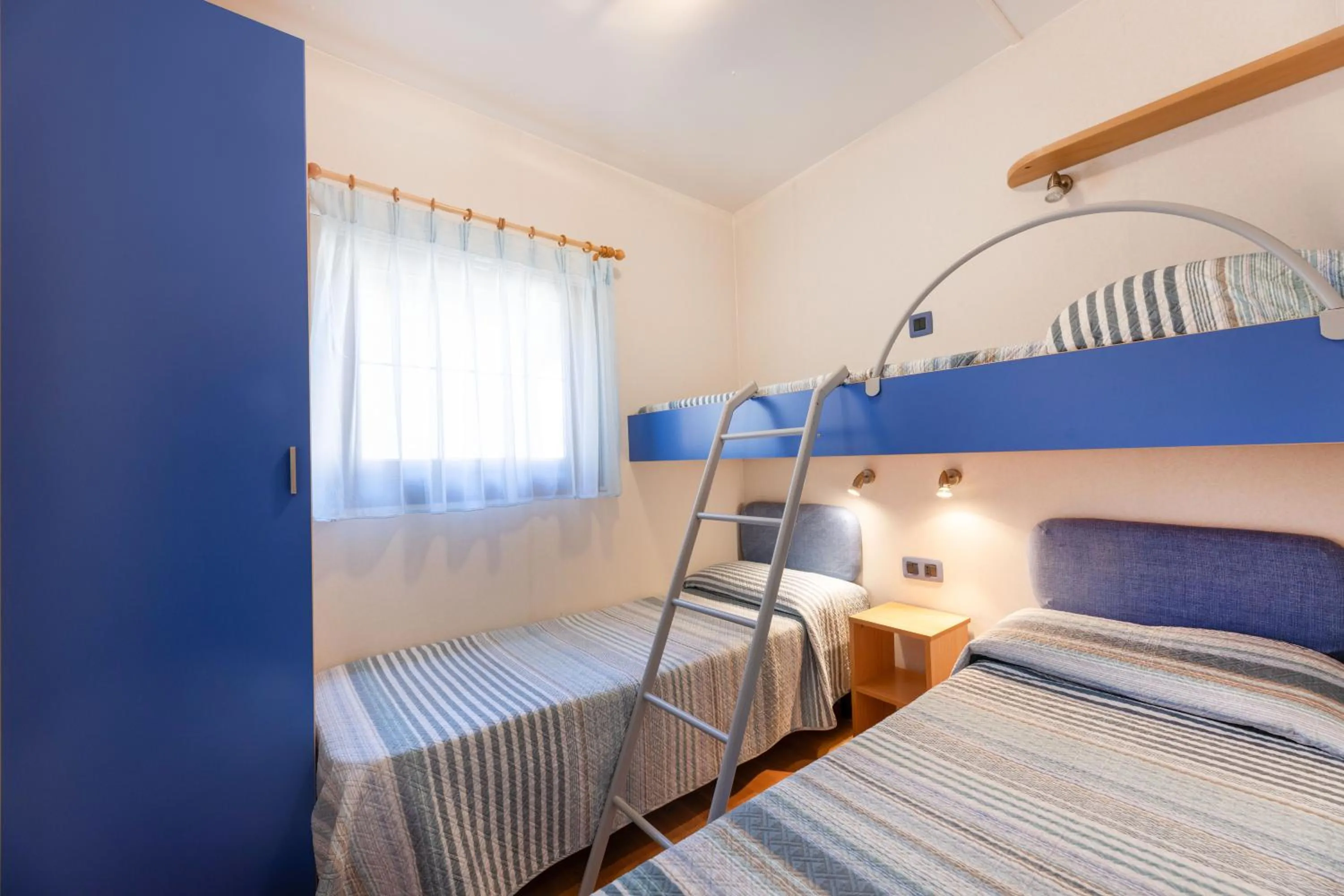 Bed in Camping Village Le Calanchiole