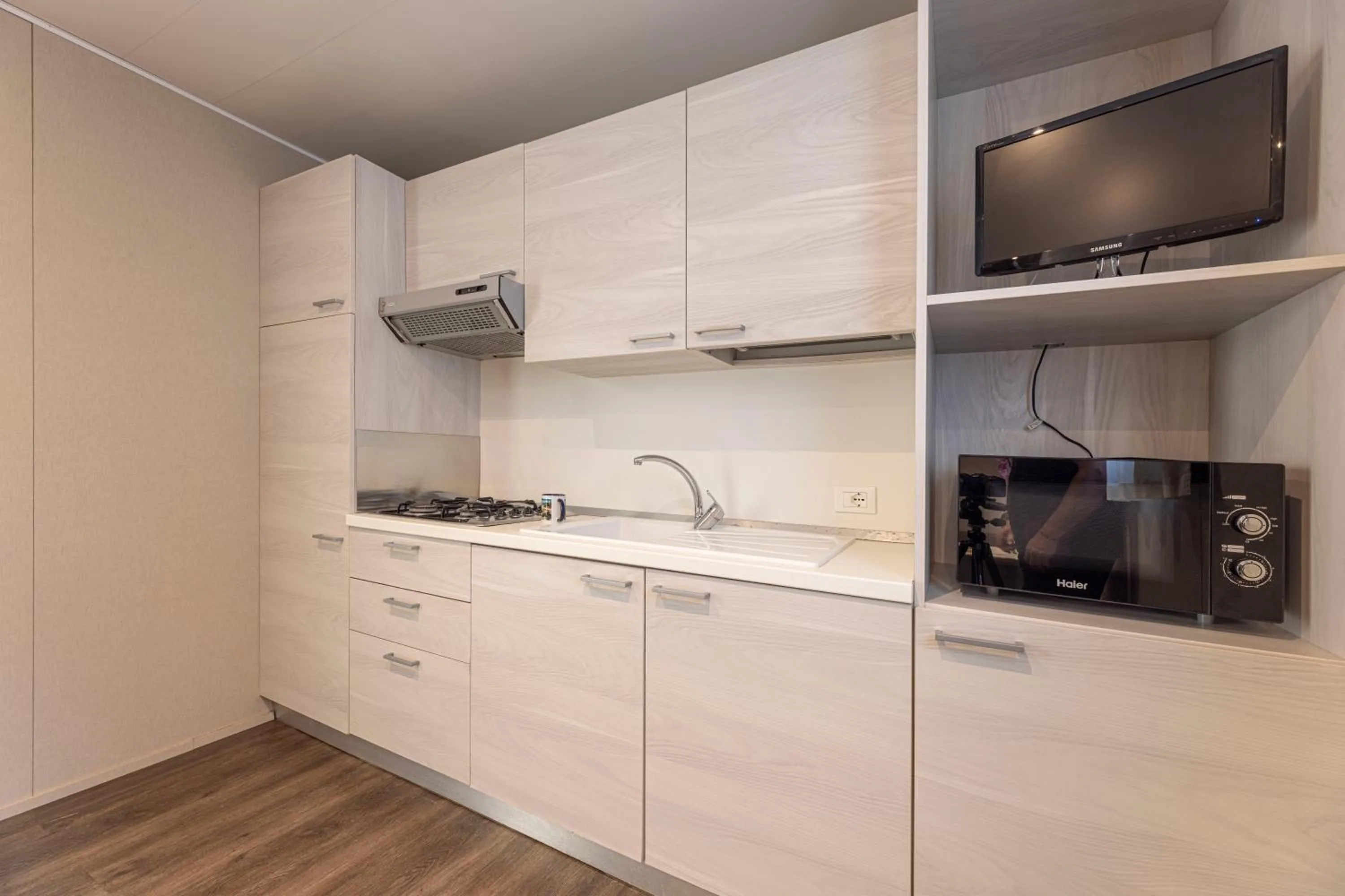 Kitchen or kitchenette in Camping Village Le Calanchiole