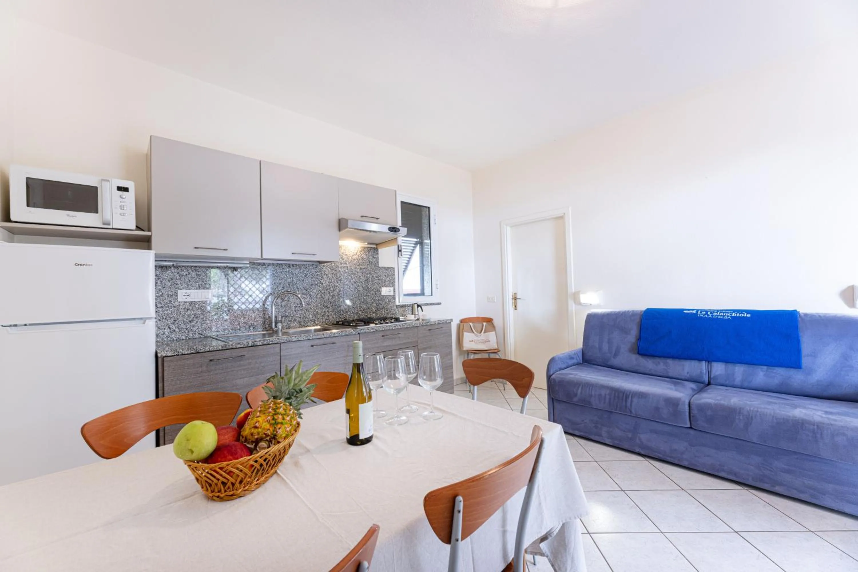 Kitchen or kitchenette in Camping Village Le Calanchiole