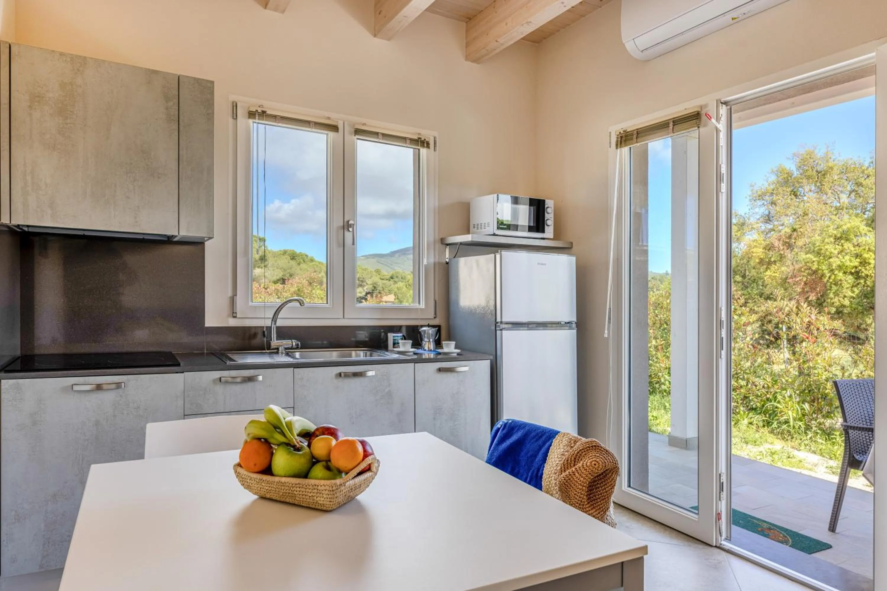 Kitchen or kitchenette in Camping Village Le Calanchiole