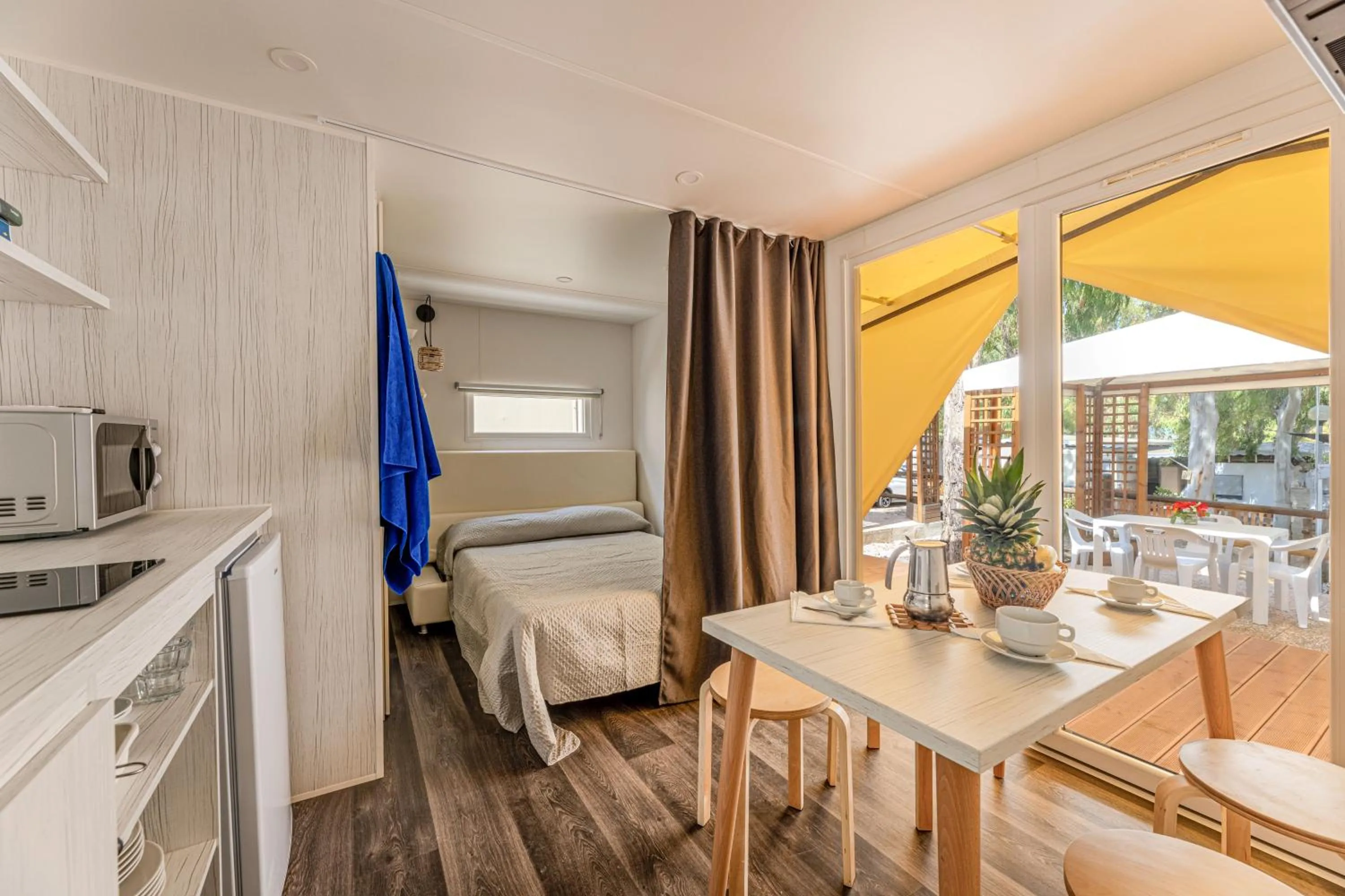 Kitchen or kitchenette in Camping Village Le Calanchiole