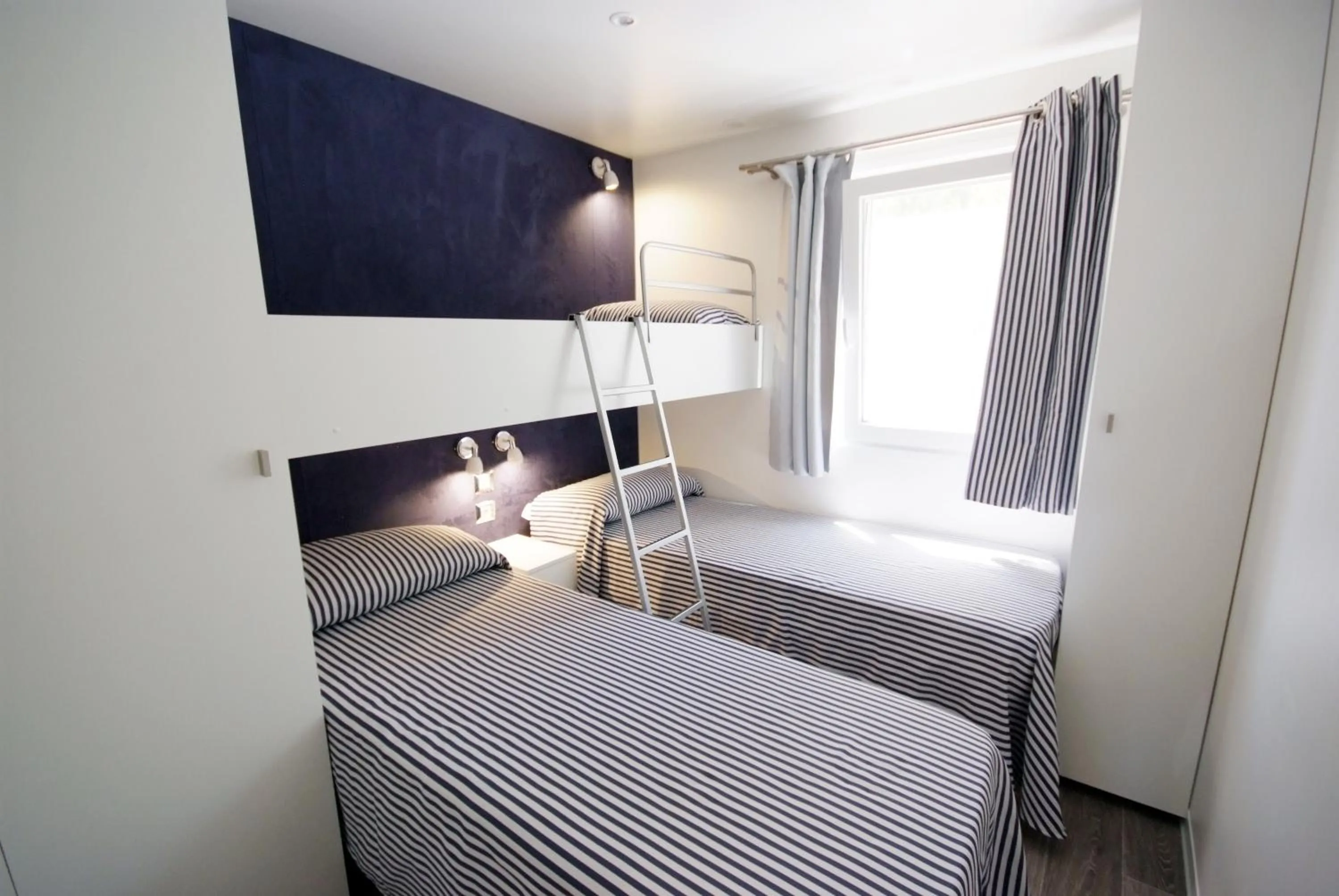 Bed in Camping Village Le Calanchiole