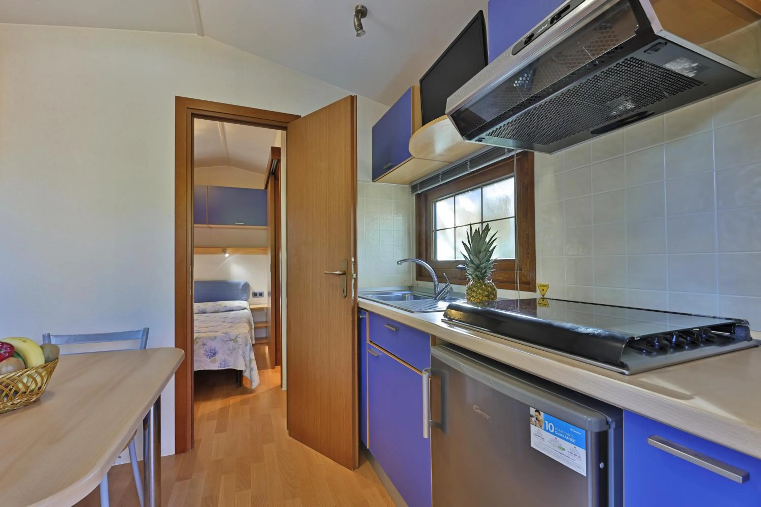 Kitchen or kitchenette in Camping Village Le Calanchiole