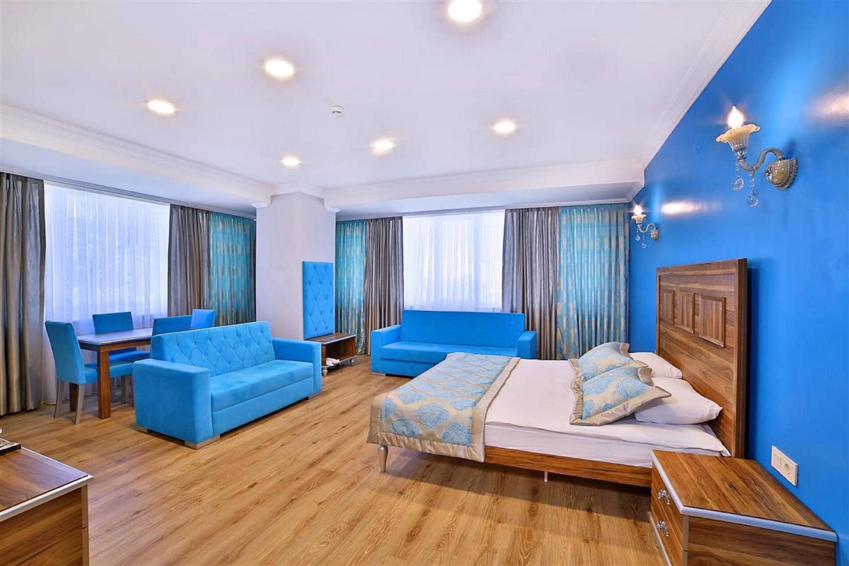 Living room, Bed in The Hera Premium Hotels